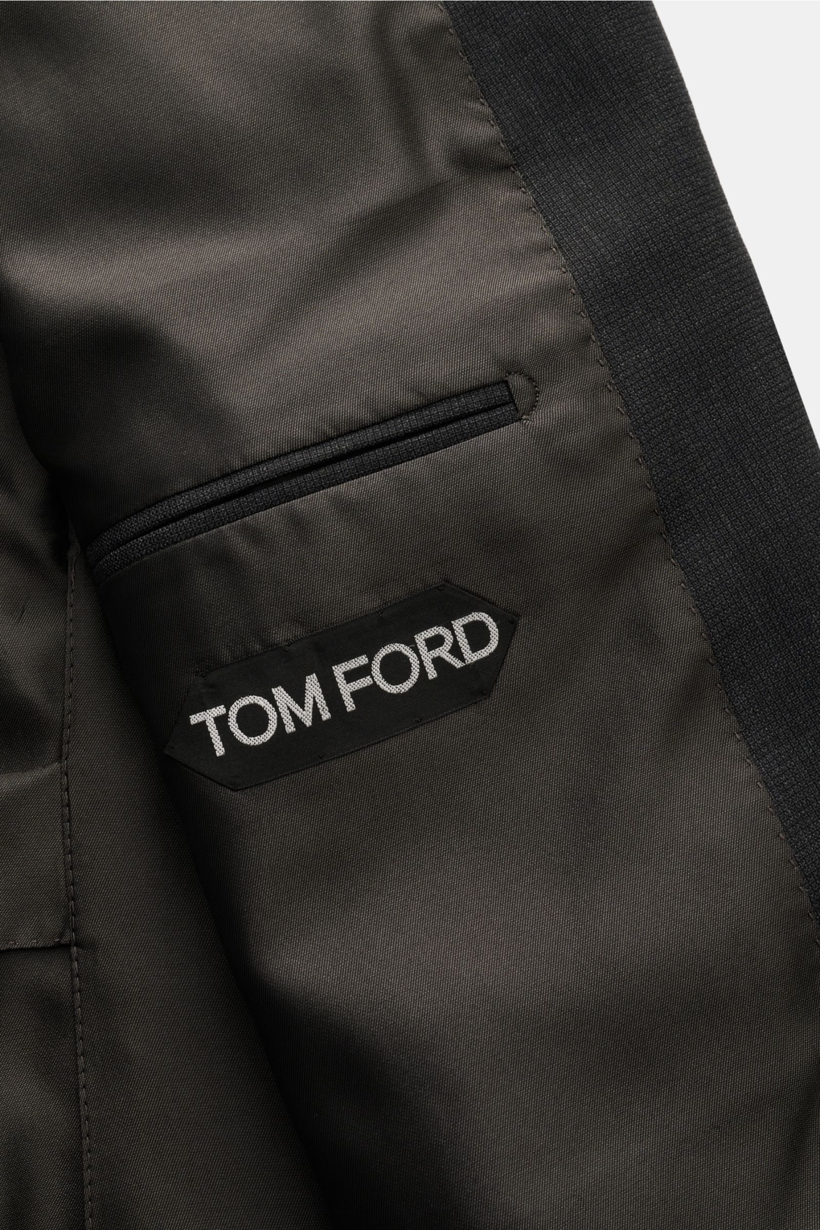 Close-up inside view of the Tom Ford Anzug 'Shelton' anthrazit meliert jacket showing smooth lining, inner pocket, and Tom Ford label.

Additional description: 
Perfektes Auftreten mit TOM FORD: Mit dem Anzug 'Shelton' aus fein gewebter Wolle, mit schm
