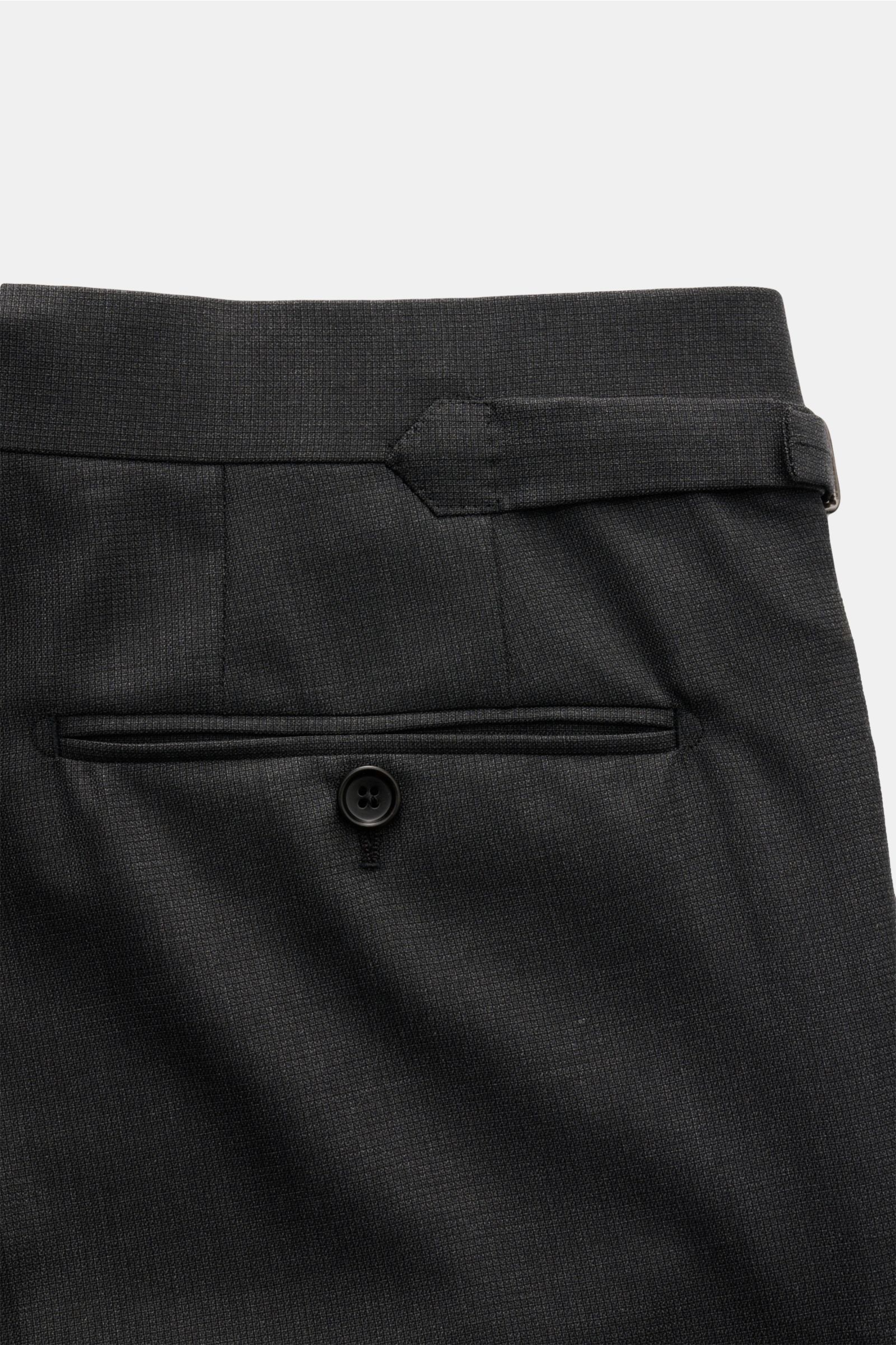 Close-up rear view of the Tom Ford Anzug 'Shelton' anthrazit meliert trousers showcasing the slim fit, side adjuster, high waistband, and buttoned welt pocket in fine woven pure wool with a smooth, structured texture.
