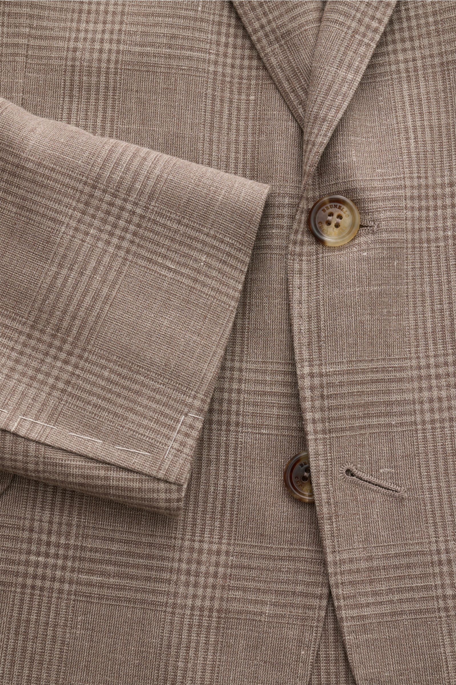 Brunello Cucinelli Anzug graubraun/grau kariert, Detailaufnahme des Unconstructed-Sakkos mit Glencheck-Muster, Knöpfen und Ärmelabschluss, edler Woll-Seide-Leinen-Mix.