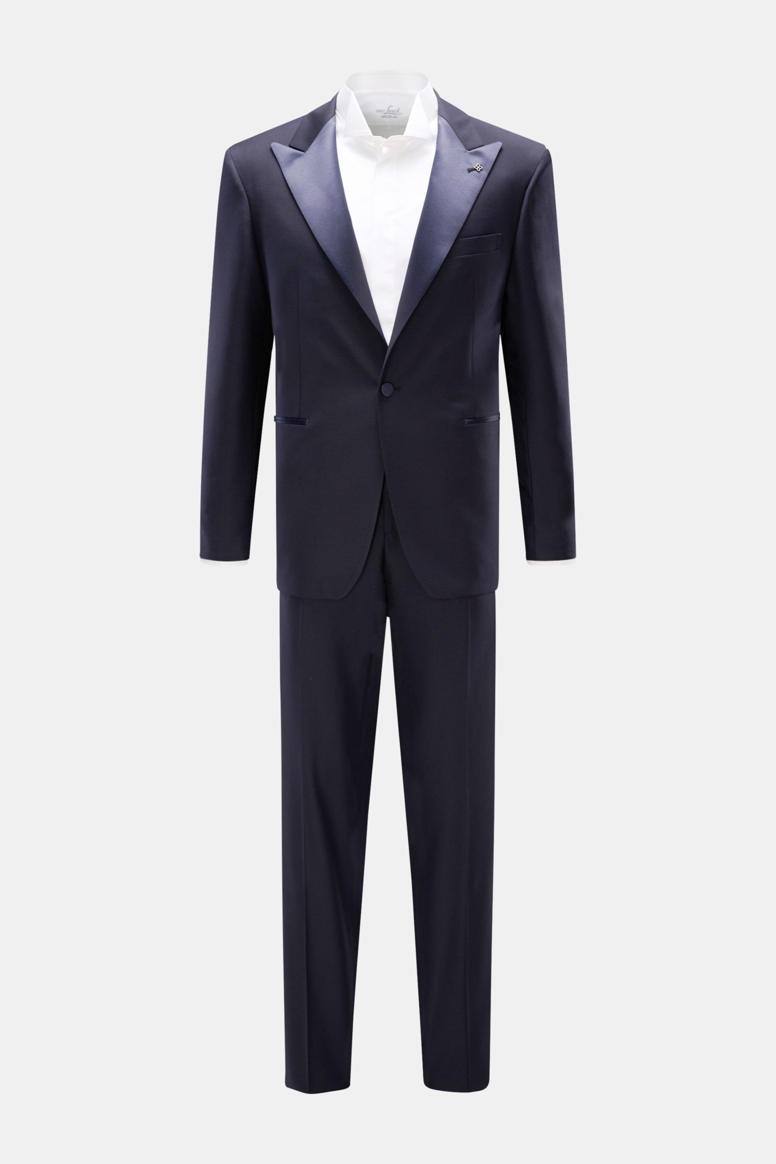 Front view of Tagliatore Tuxedo navy in pure Super 110'S virgin wool with satin lapel, slim fit jacket, and tapered trousers, styled with white shirt.
