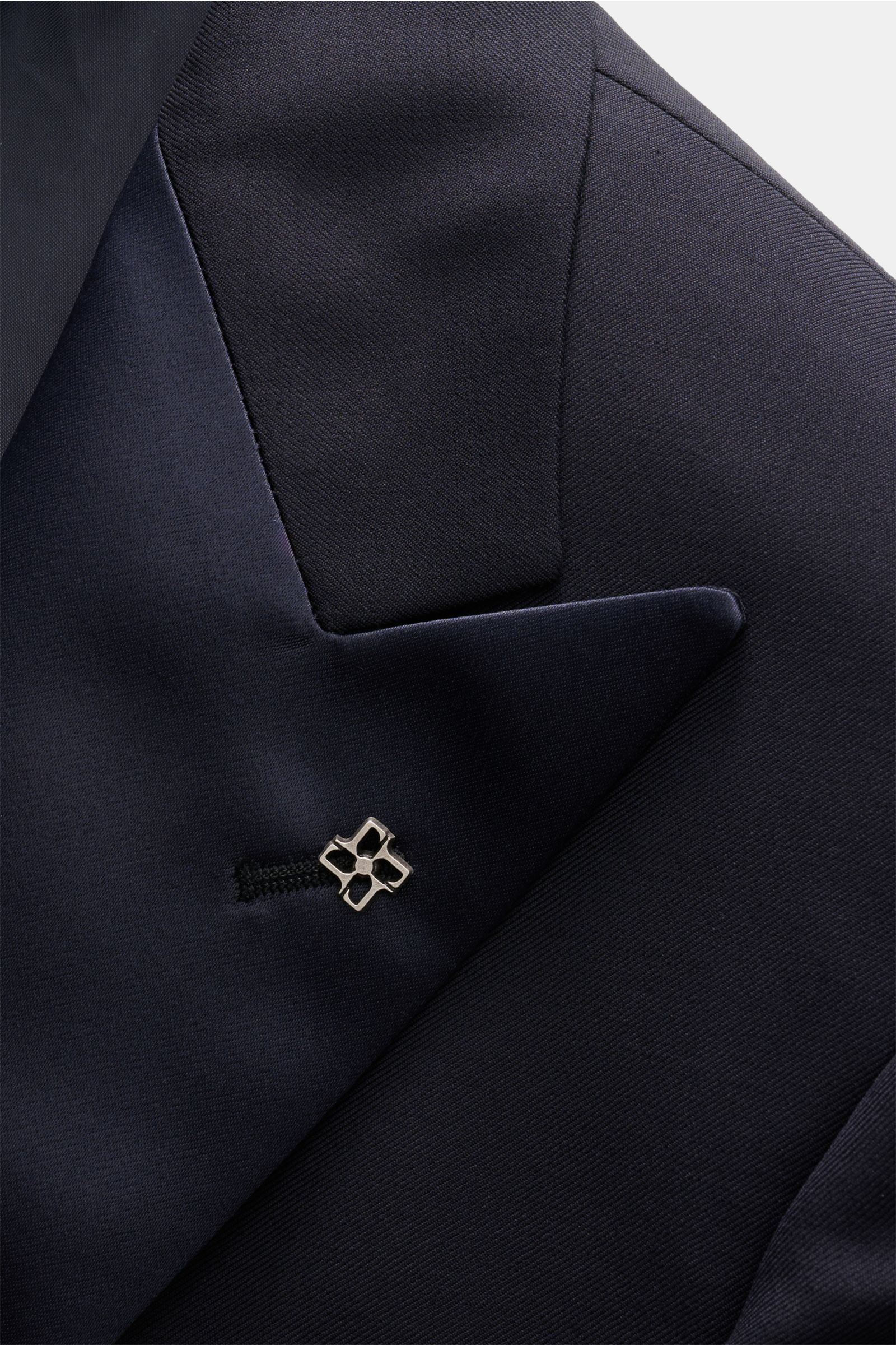 Close-up front angle of Tagliatore Tuxedo navy lapel showing satin-faced pointed lapel, signature pin, and smooth pure Super 110'S virgin wool fabric.

Italian evening wear for elegant occasions: Draw attention to yourself in style with this classy tux