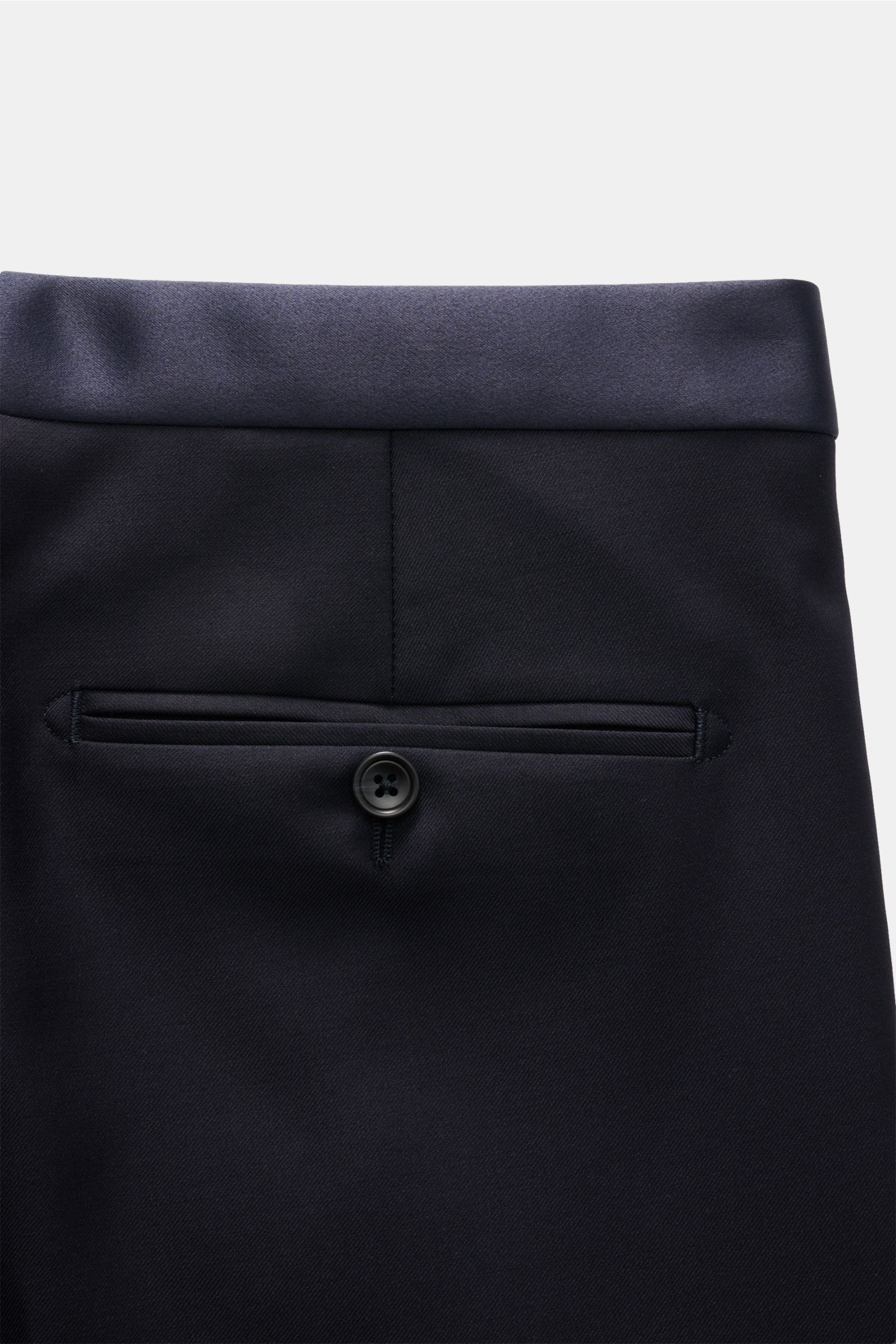 Close-up rear view of the Tagliatore Tuxedo navy trousers in pure Super 110'S virgin wool, showing buttoned back pocket and satin waistband.