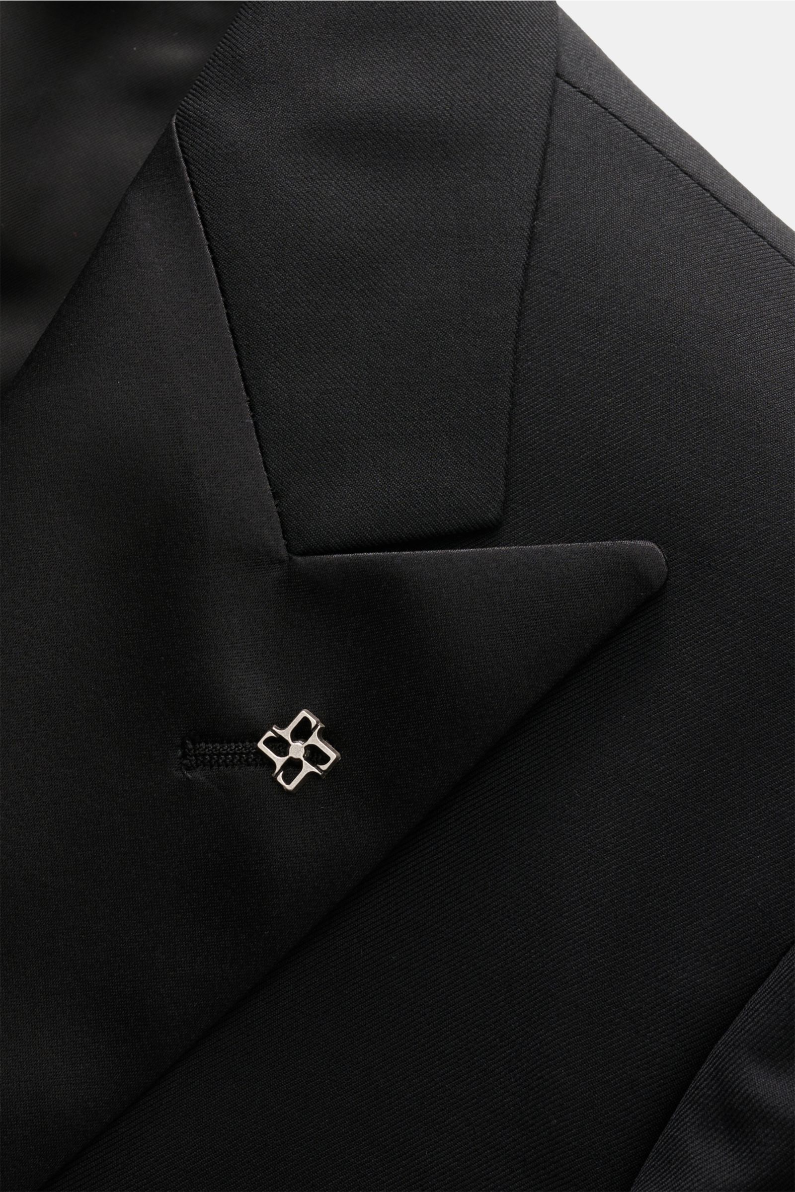 Close-up front view of the Tagliatore Tuxedo black lapel in pure Super 110'S virgin wool with a slim fit, satin facing, and signature pin.