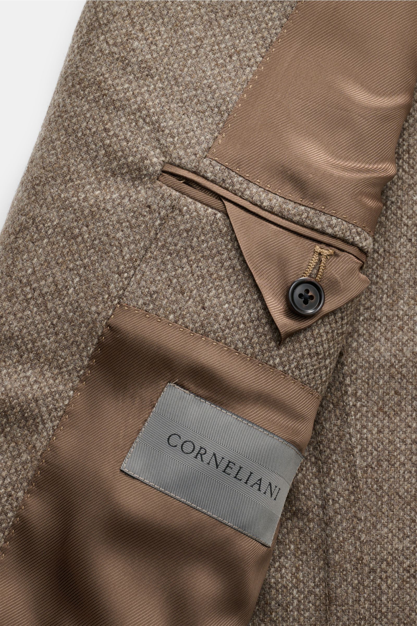 Corneliani Sakko taupe meliert in Nahaufnahme innen mit weichem Griff, markanter Webstruktur, halb gefüttert, vier Innentaschen, Knopfdetails.