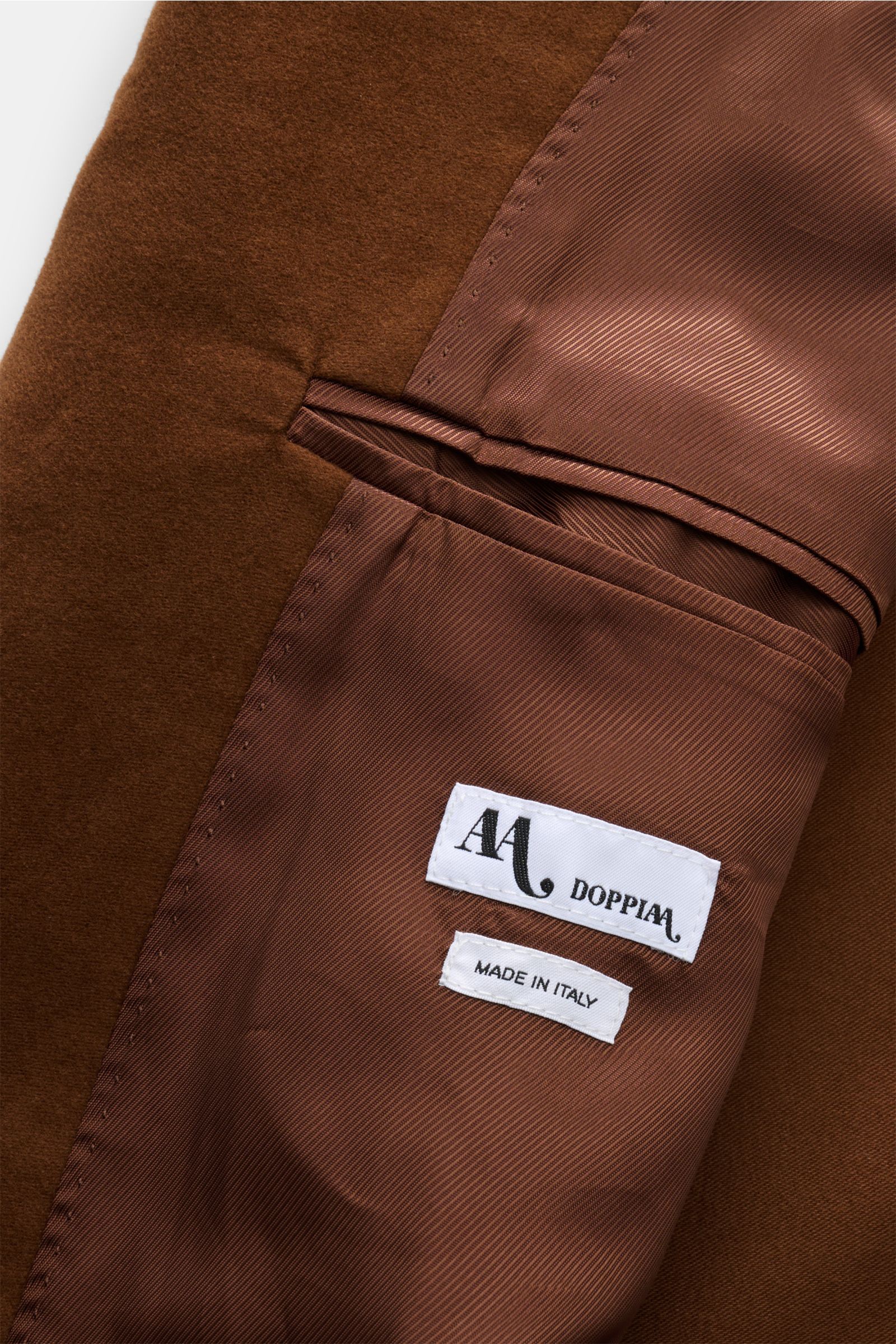 Doppiaa Sakko 'Aaradeo' braun halb gefüttert, Innenansicht des Baumwoll-Fleece mit Innentasche und Label, Detailaufnahme.