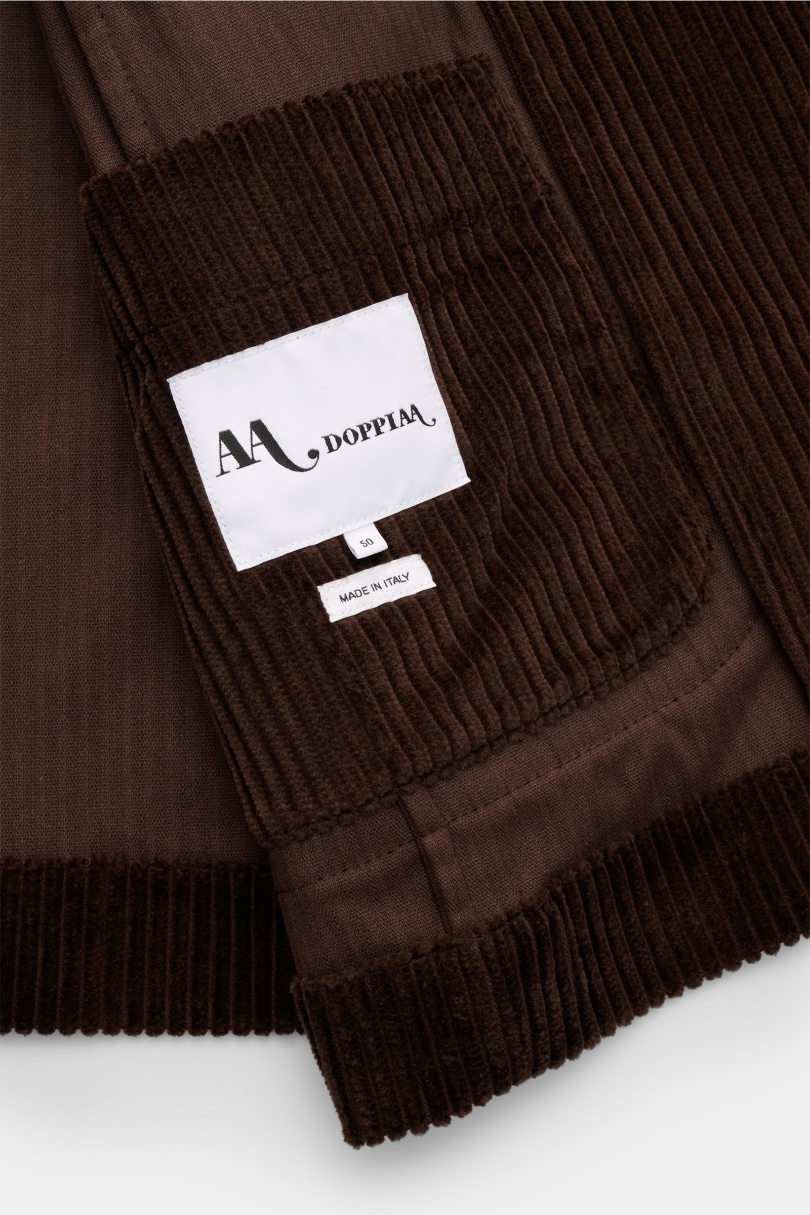 Nahaufnahme des Innenfutters vom Doppiaa Cord-Sakko 'Aansonia' dunkelbraun aus Baumwoll-Cord mit Innentasche, Slim Fit und verdecktem Knopf.
