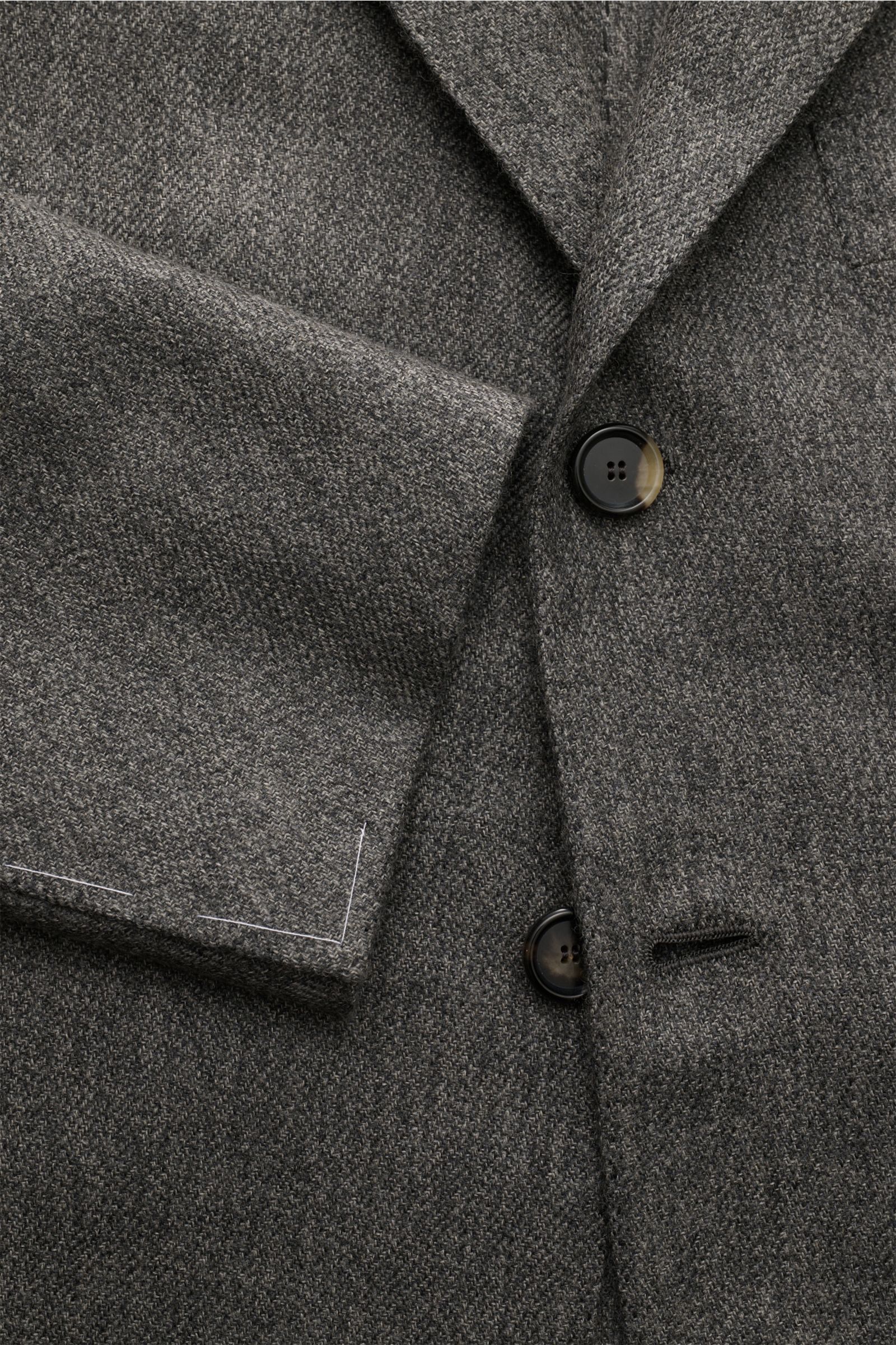 Close-up front view of Cesare Attolini Cashmere jacket grey mottled, showing button details and fabric texture.

Enjoy luxury from CESARE ATTOLINI: This timeless smart-casual jacket is made in Italy from the finest pure cashmere – a masterpiece to take