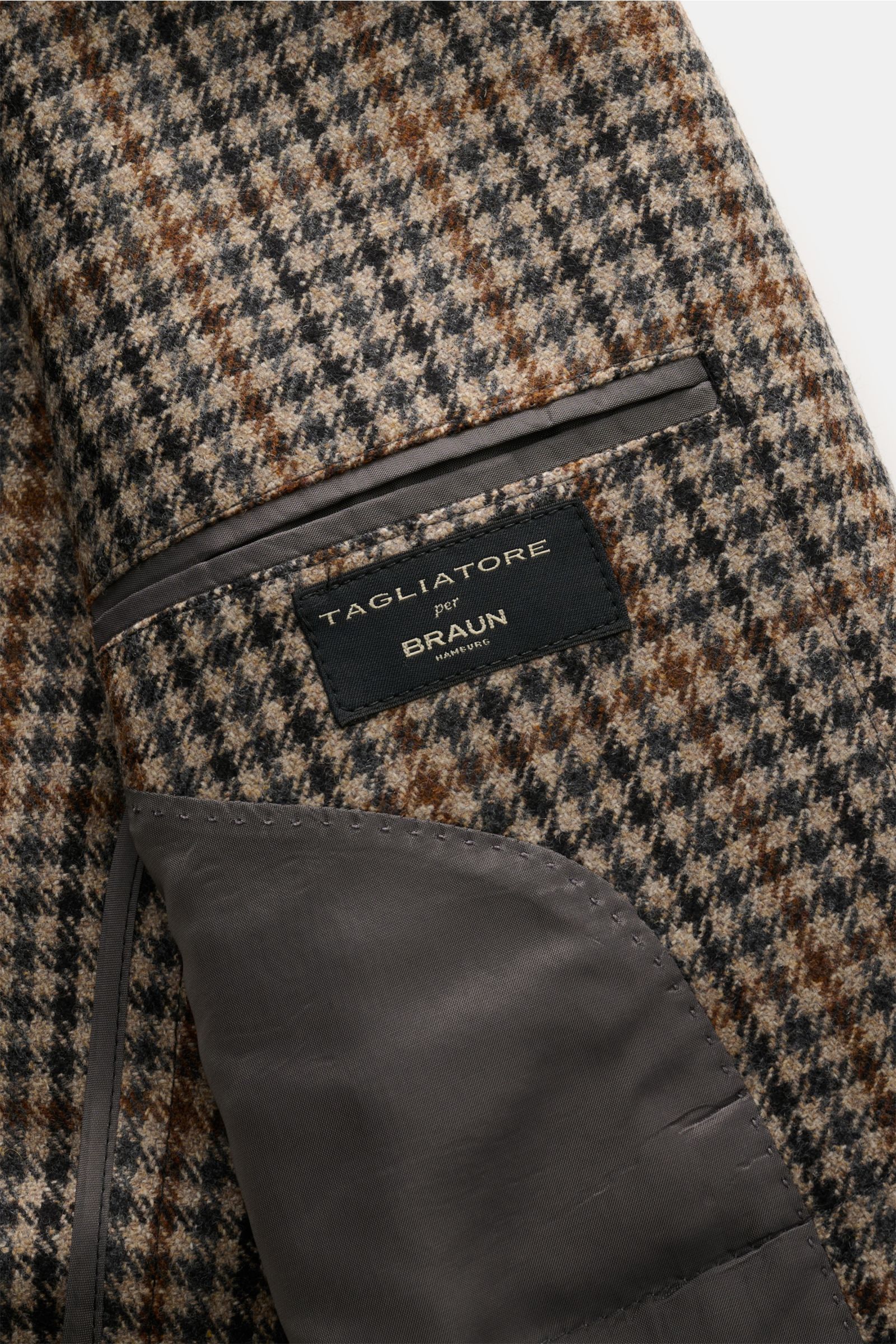 Nahaufnahme des Innenfutters mit Etikett von Tagliatore Blazer beige/schwarz/braun kariert aus reiner Wolle im klassischen Hahnentritt-Muster.
