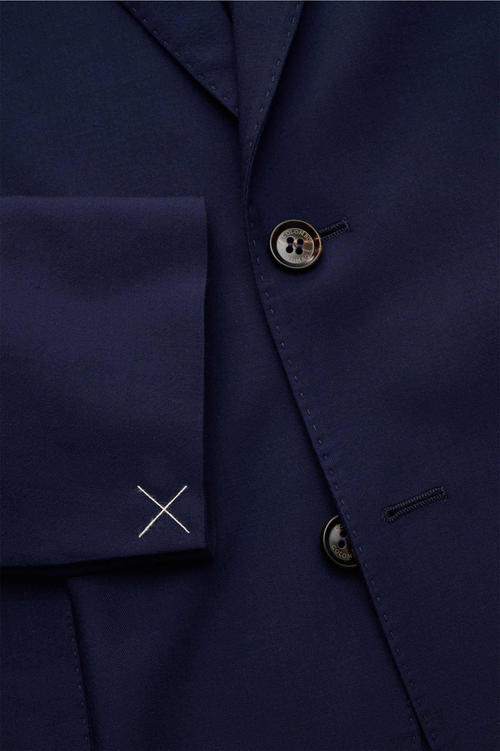 Colombo Cashmere blazer navy shown from a close-up front angle, highlighting soft cashmere fabric, two-button style, step lapel with pin, and cuff detail. Pure luxury from specialists COLOMBO: This lightweight blazer in super soft cashmere is the perfe