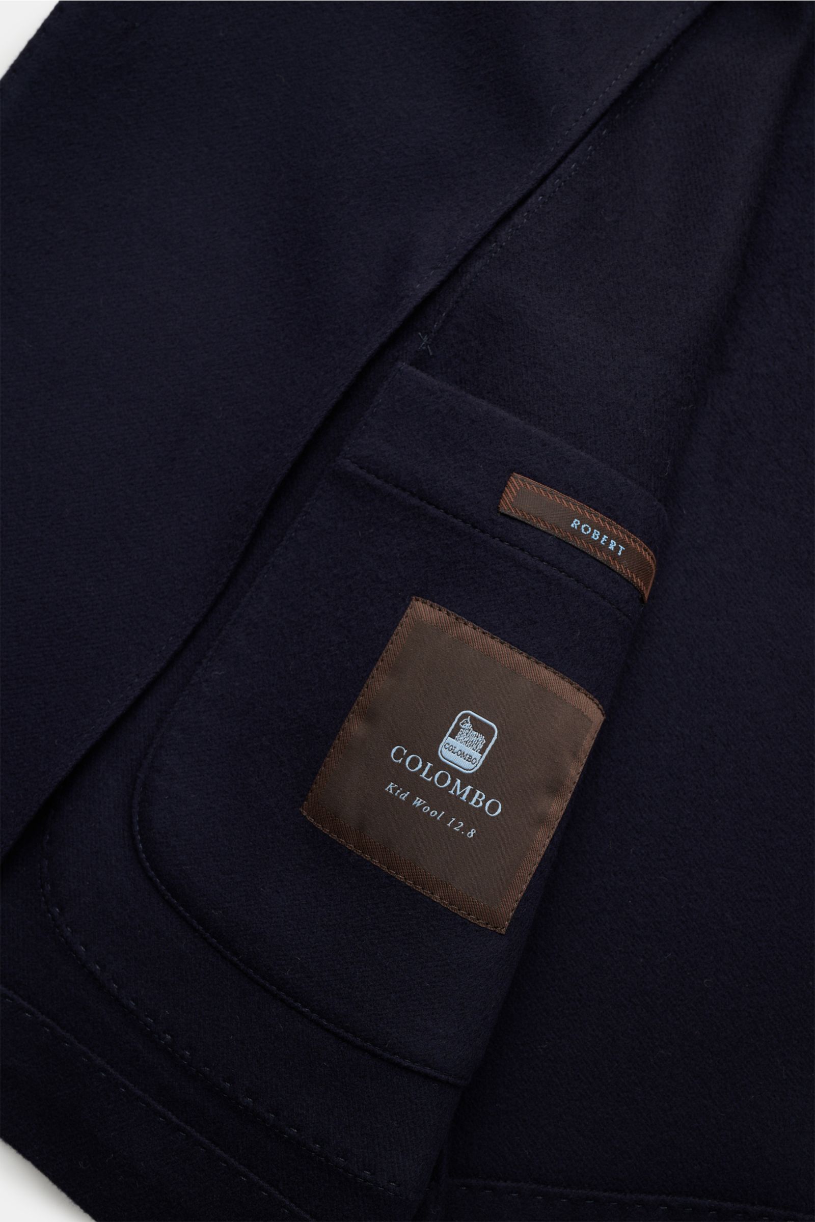 Colombo Sakko navy Innenansicht mit Label aus reiner Wolle, weicher Griff, Slim Fit, zwei Innentaschen, unconstructed Design.