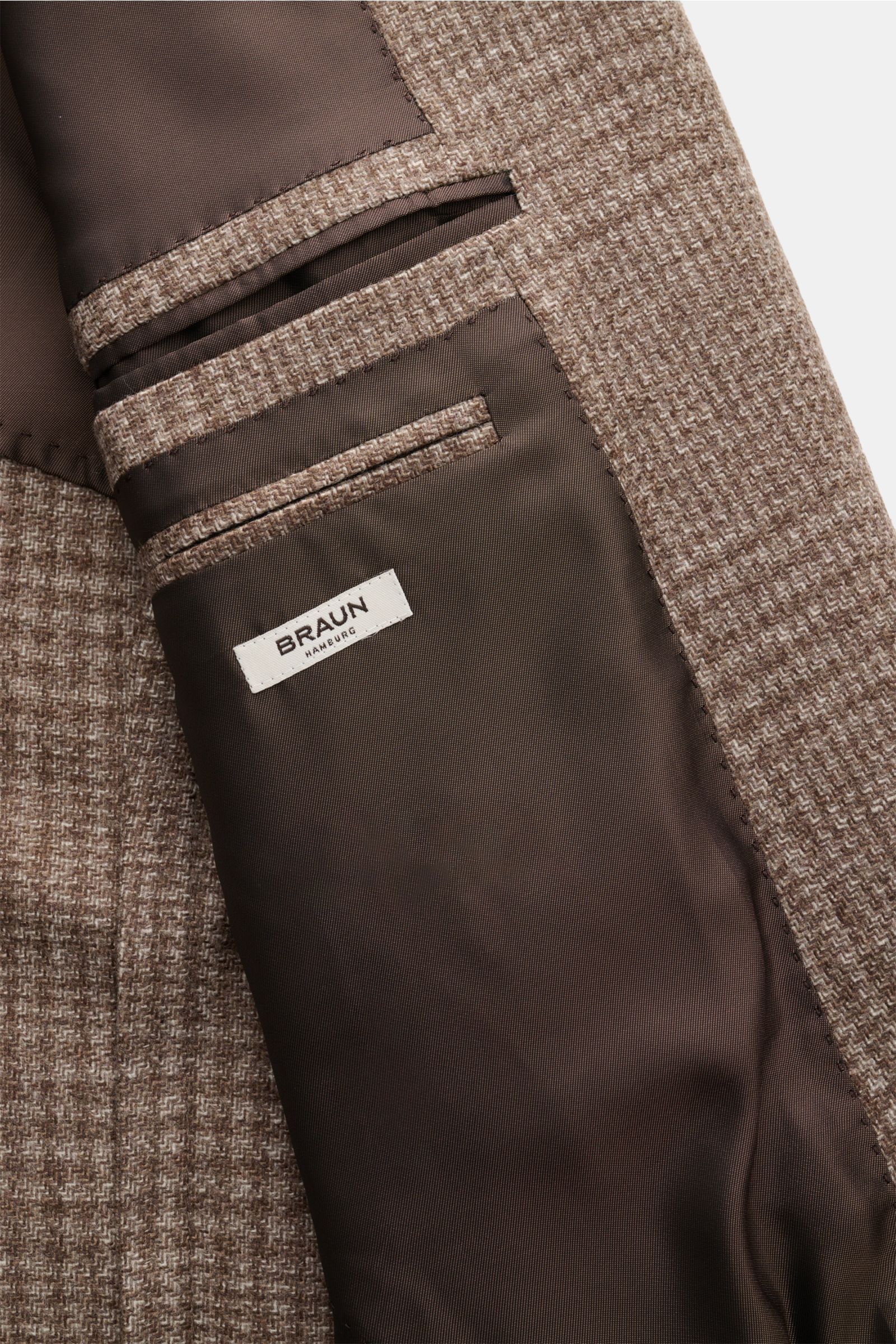 Innenansicht des Zegna Sakko graubraun kariert mit Woll-Cashmere-Mix, Karo-Webstruktur, drei Innentaschen und weichem Griff.