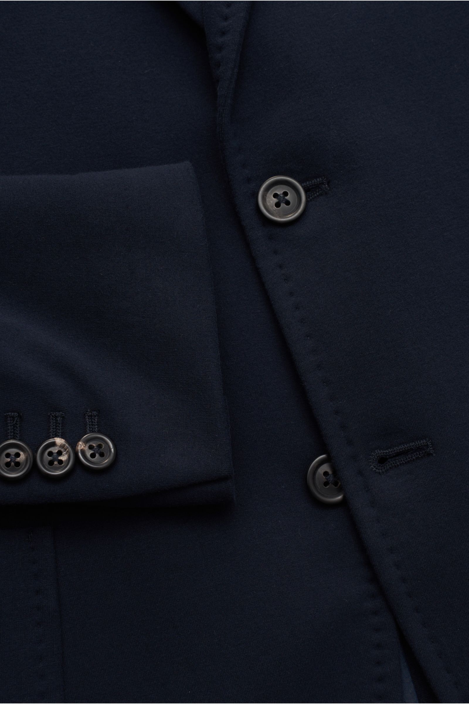 Close-up front view of the Circolo 1901 Jersey jacket navy showing buttons and cuff details in slim fit stretchy cotton.

This slim fit jersey jacket in stretchy cotton by CIRCOLO 1901 features a contemporary unconstructed design and unsurpassed comfor