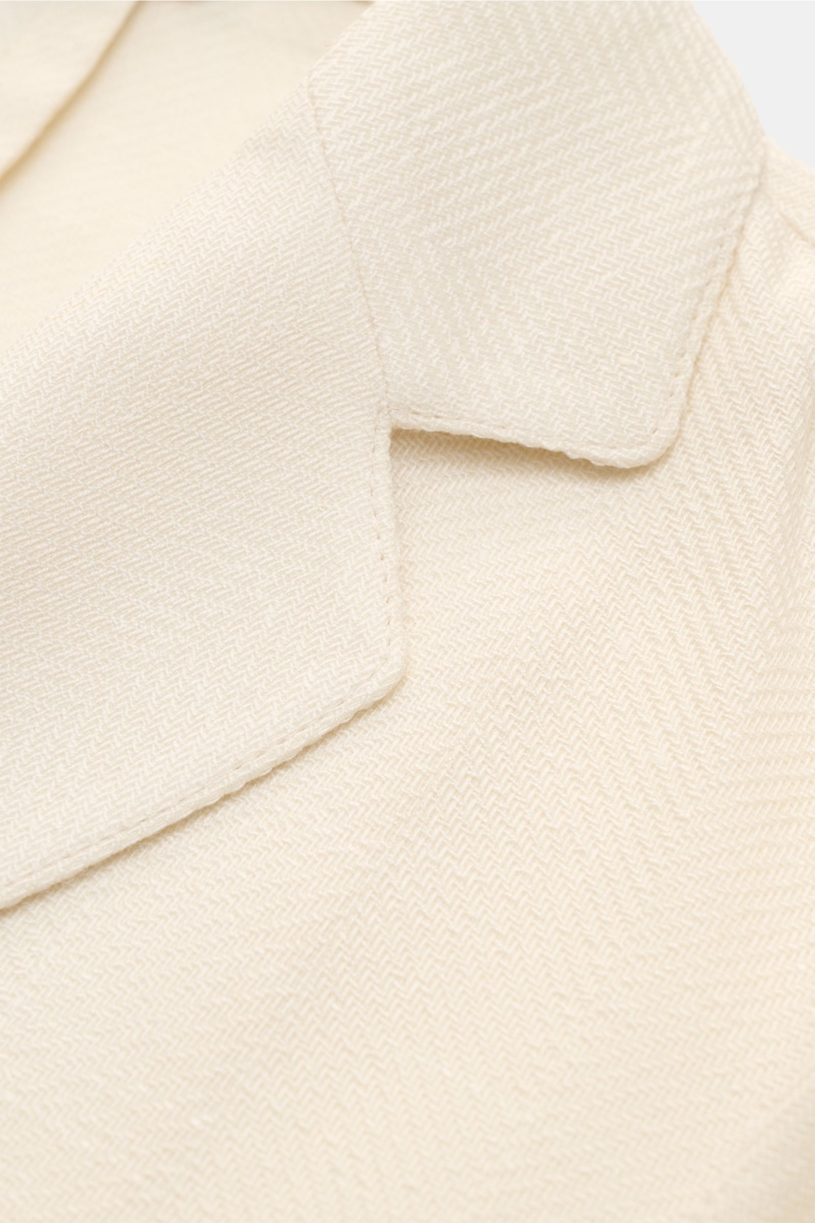 Close-up front view of Marco Pescarolo Blazer 'Giove' cream showing step lapel and tonal weave in wool, cashmere, silk, and hemp blend.

Description: Lightweight blazer with maximum comfort: MARCO PESCAROLO designs not just elegant trousers but also bl