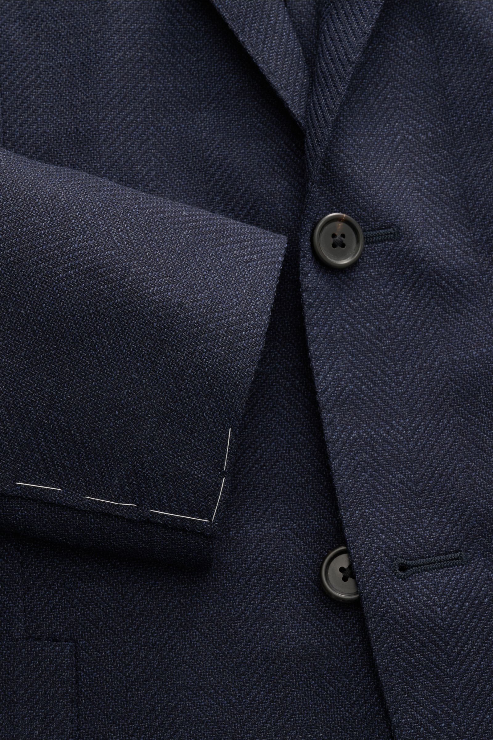 Close-up front view of Corneliani Smart-casual jacket navy mottled in elastic virgin wool, slim fit with two-button style and distinctive weave.  

Timeless sophistication: This CORNELIANI smart-casual jacket, crafted from fine virgin wool, combines cl