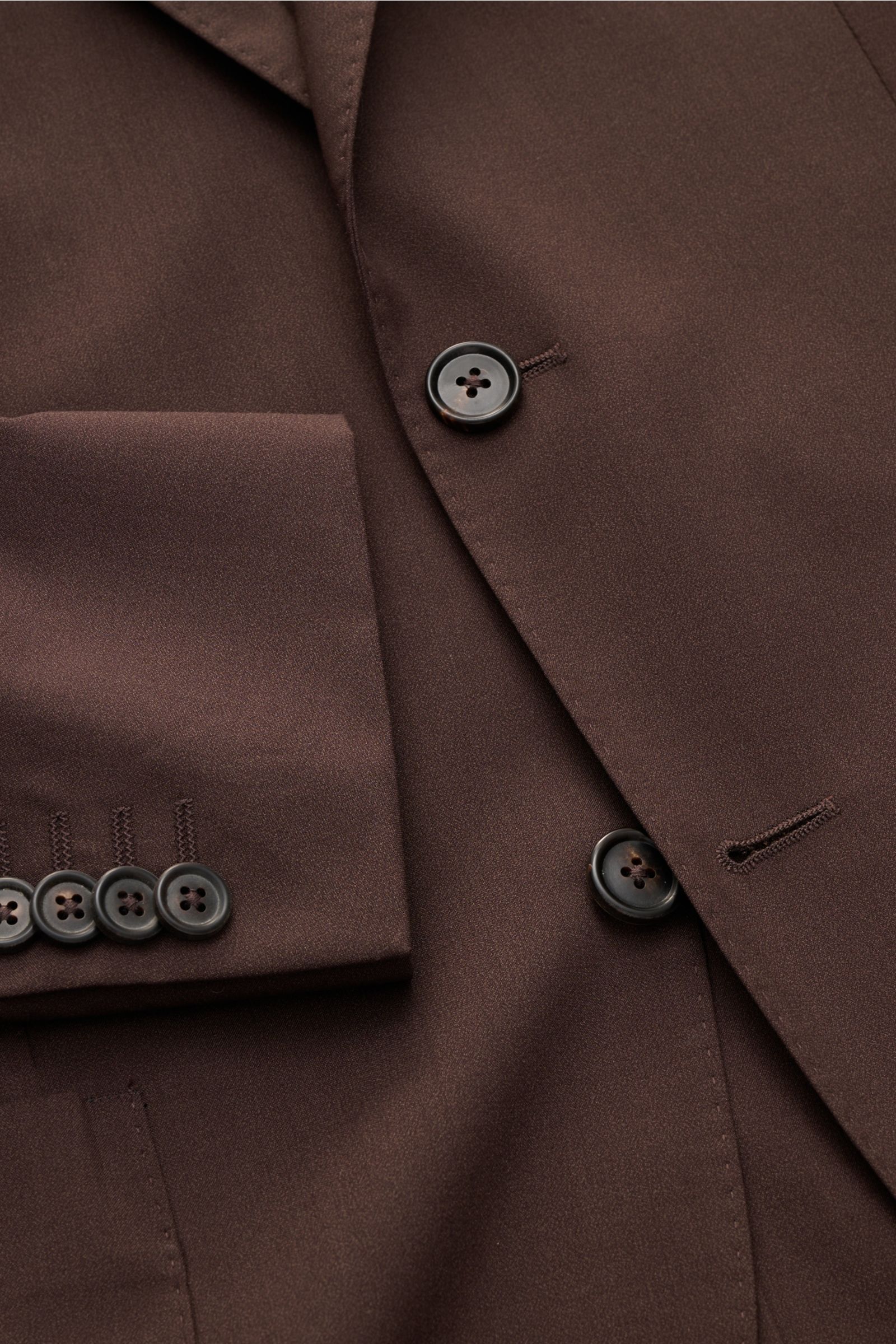 Alt tag (125 characters):
Close-up front view of Corneliani Smart-casual jacket dark brown in wool-silk blend with buttons and lapel details.

Description:
Easy style all summer long: this smart-casual jacket in a fine wool-silk blend has been made in 