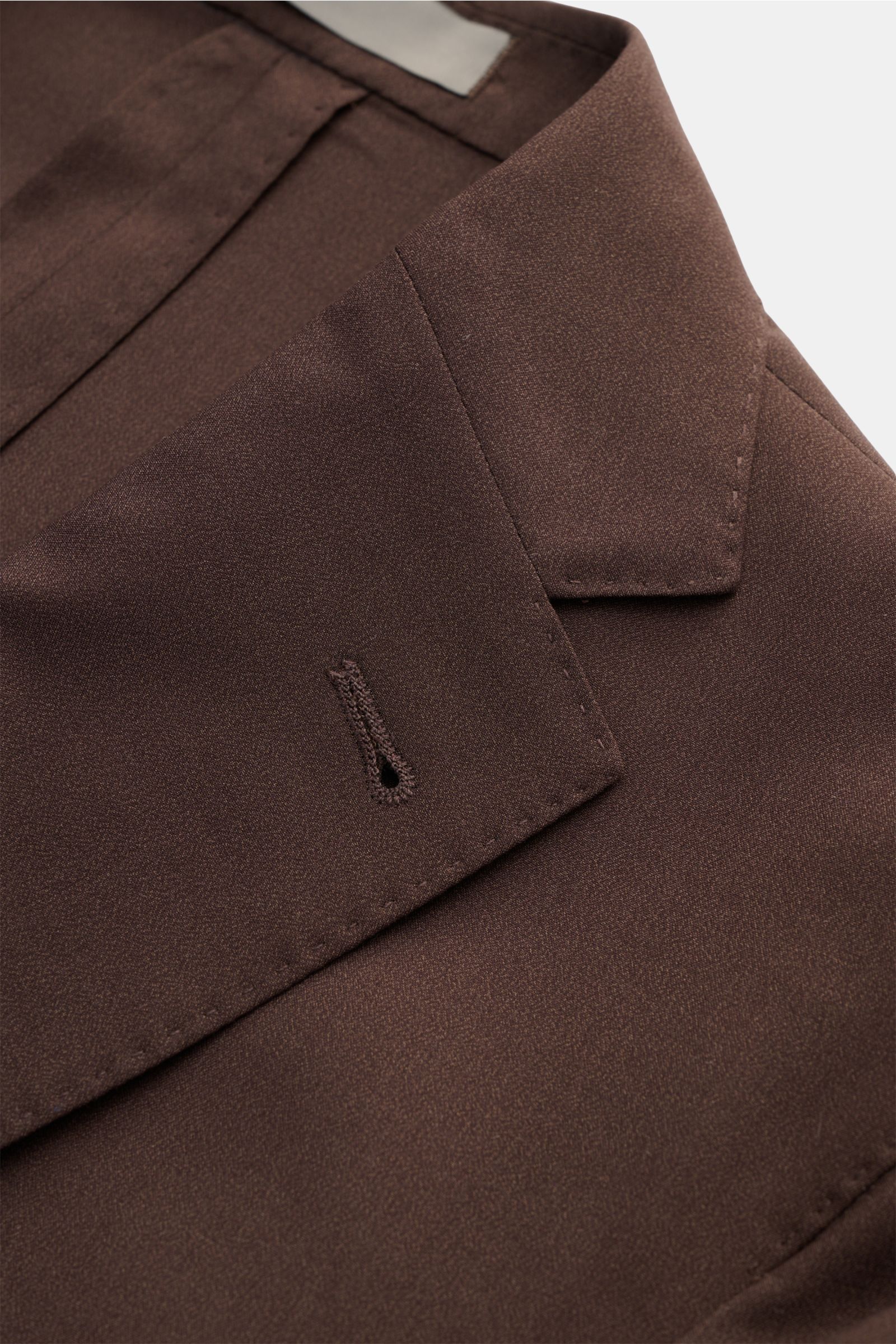 Close-up front view of Corneliani Smart-casual jacket dark brown showing the step lapel and buttonhole in fine wool-silk blend.

Easy style all summer long: this smart-casual jacket in a fine wool-silk blend has been made in an optimal fit by Italian m