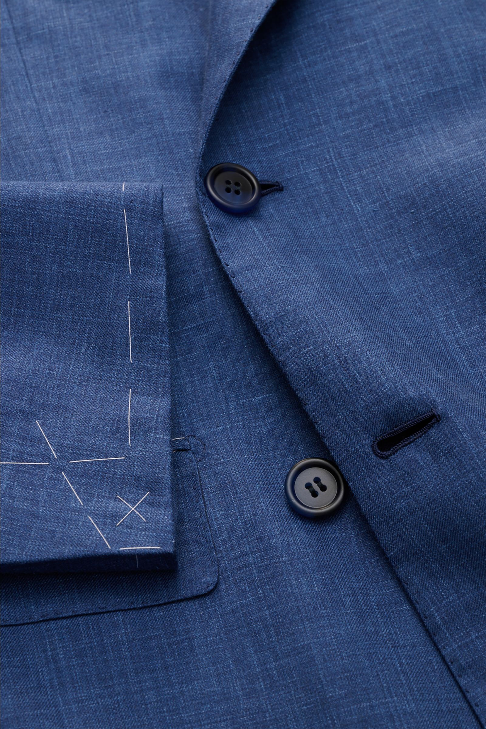 Close-up front view of the Brioni Smart-casual jacket 'New Plume' grey-blue mottled showing lightweight silk-cashmere fabric, double-breasted buttons, and unfinished sleeve cuffs.

A lightweight mottled fabric made from a high-quality blend of silk and