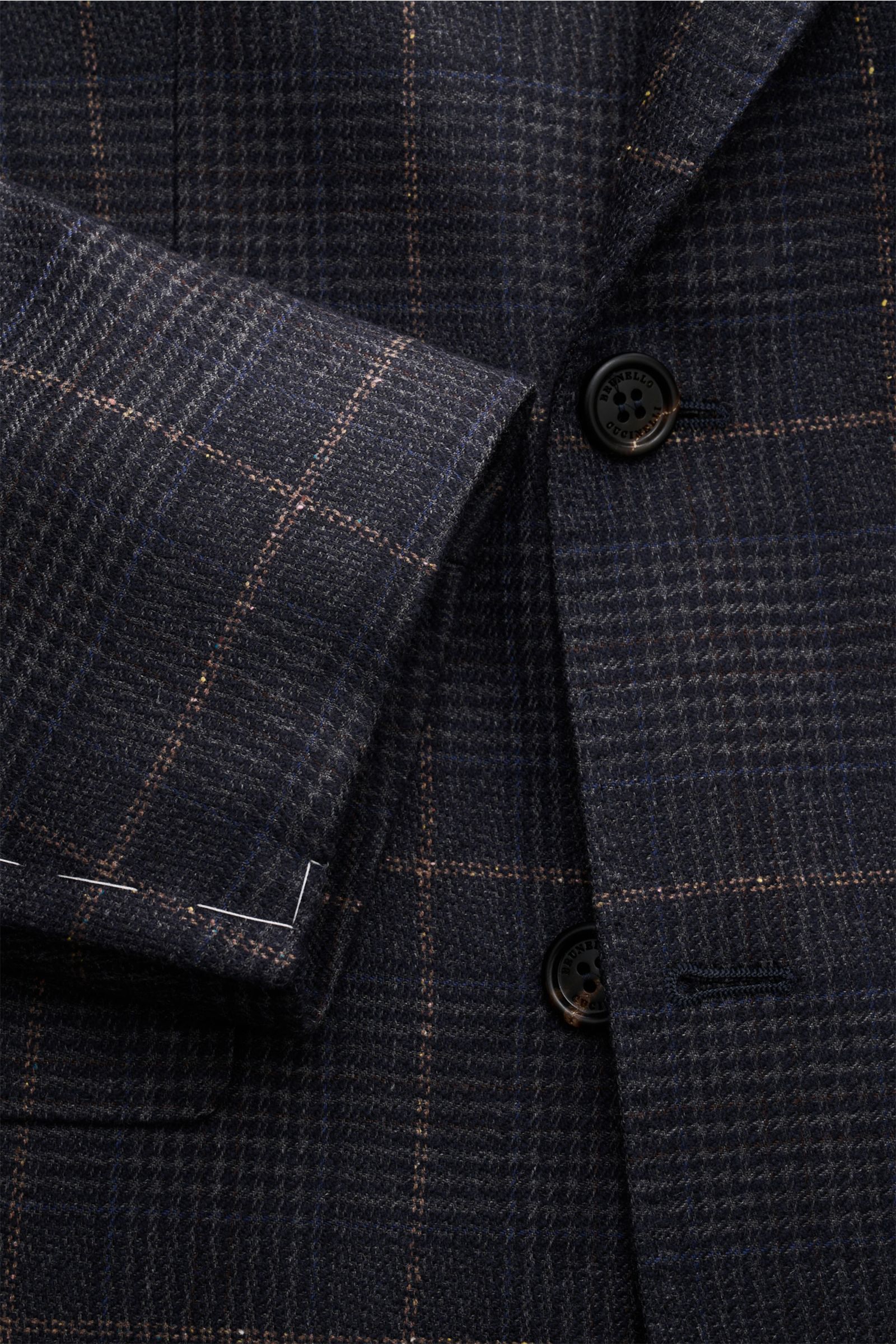 Close-up front-left view of Brunello Cucinelli Smart-casual jacket dark grey/navy/light brown checked, showcasing its cashmere-virgin wool blend, slim fit, double-breasted three-button style, pointed lapel, classic glen check pattern, breast and hip flap 