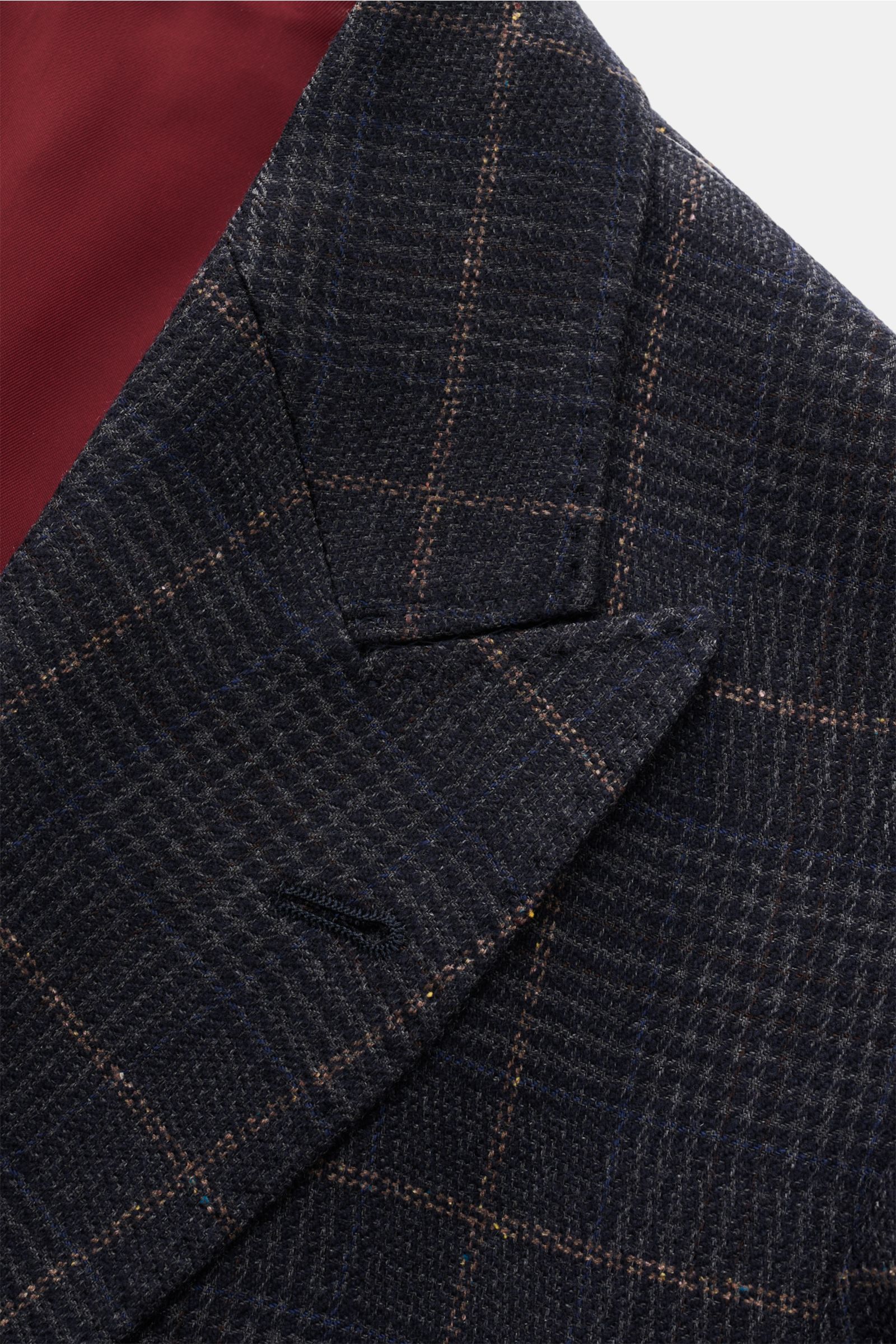 Close-up front view of Brunello Cucinelli Smart-casual jacket dark grey/navy/light brown checked with classic glen check pattern and pointed lapel.