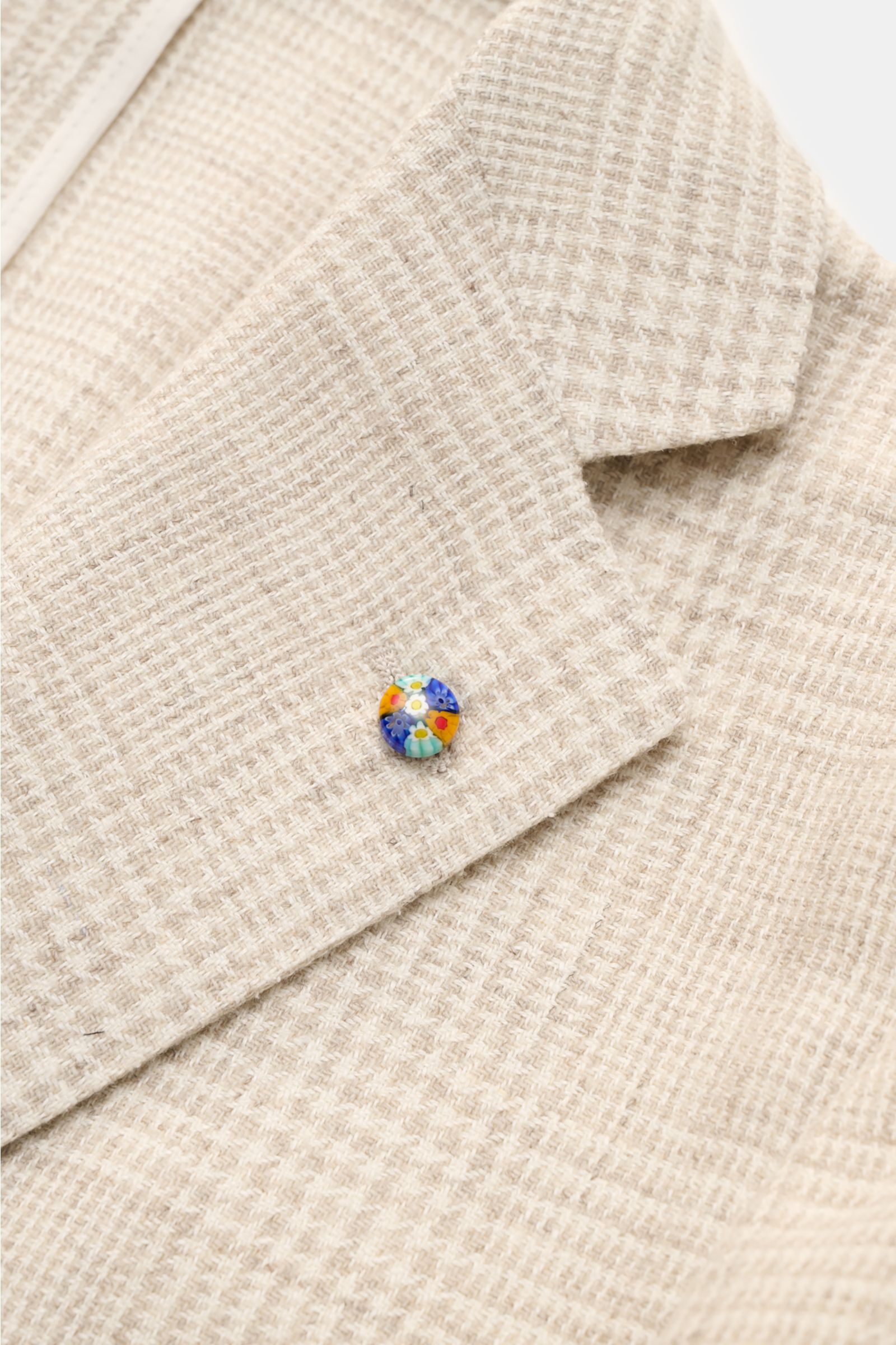 Close-up front angle of Belvest Smart-casual jacket cream/beige checked with soft wool, linen, silk, cashmere blend and classic glen check pattern, featuring slim fit, three-button style, step lapel with pin, breast and patch hip pockets, unfinished sleev