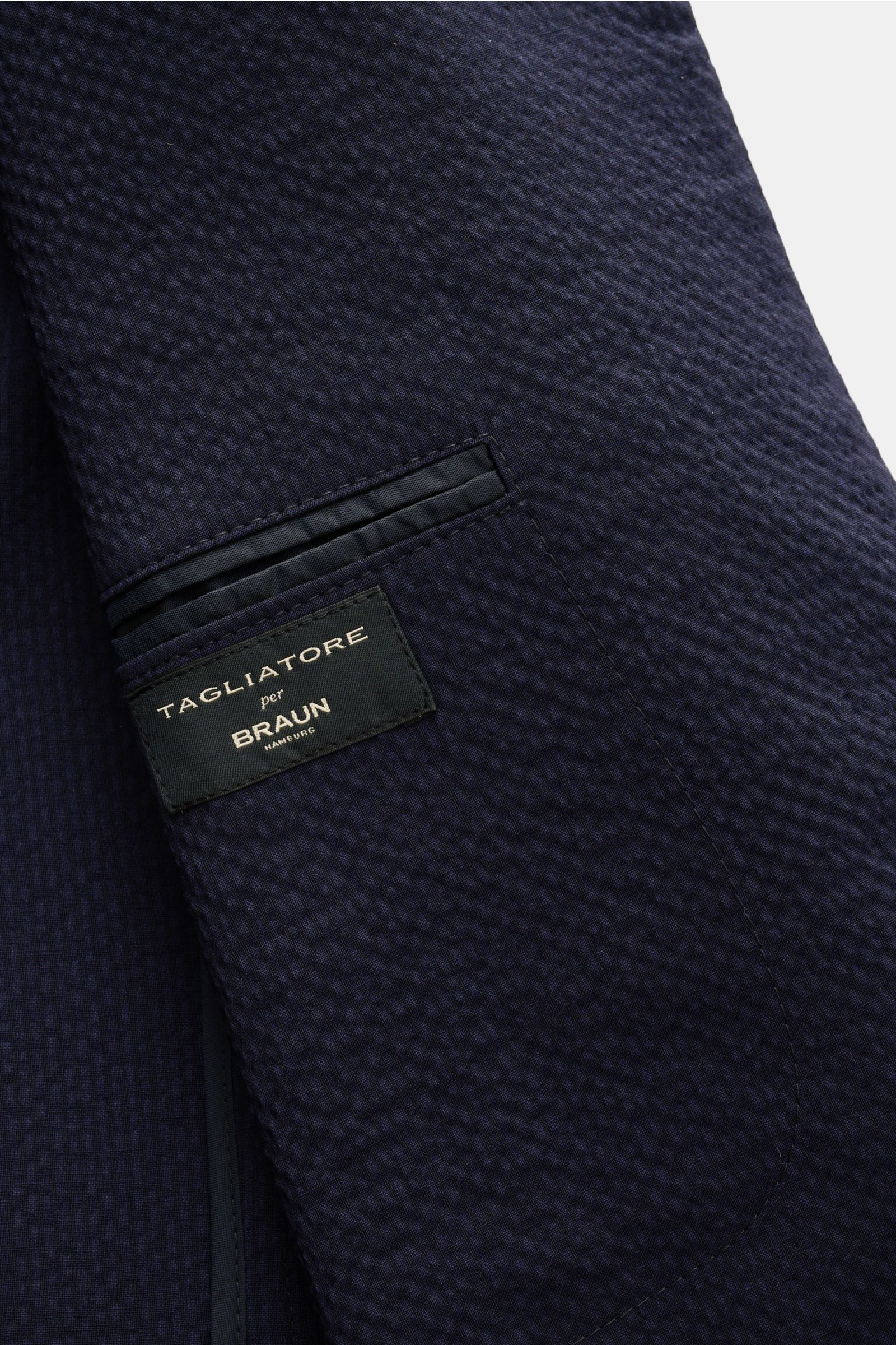 Close-up of the interior sleeve of the Tagliatore Smart-casual jacket 'Monte Carlo' navy, showing seersucker texture, inner pocket, and label.