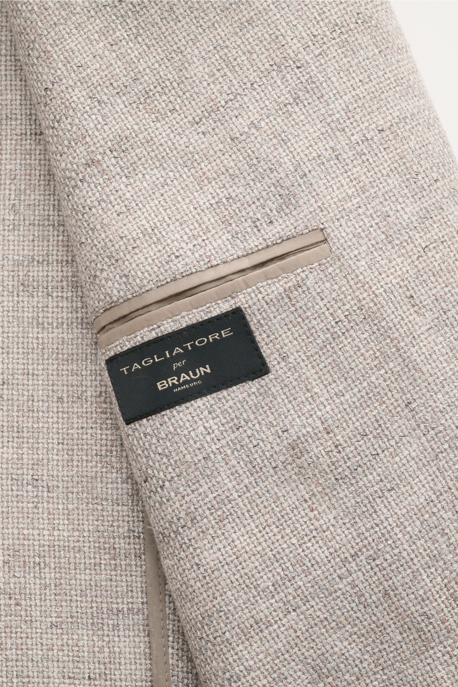Nahaufnahme des Innenfutters mit Label am Ärmel des Tagliatore Sakko 'Monte Carlo' grau meliert aus Seide, Leinen und Baumwolle im Unconstructed Design.