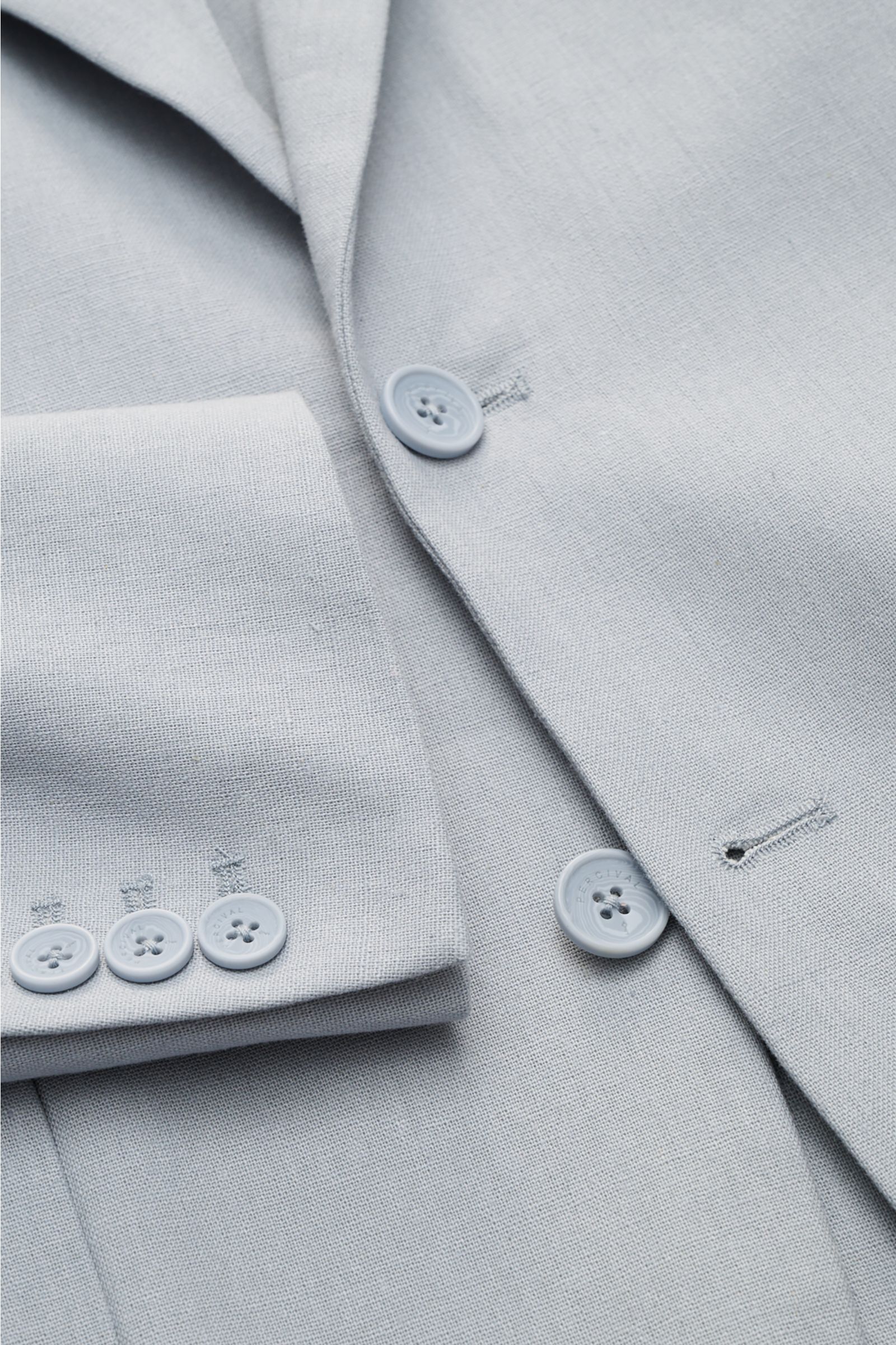 Close-up view of the Percival Smart-casual jacket 'Tailored Linen' smoky blue showing button details and textured linen-cotton fabric. Combines texture and everyday suitability: This versatile smart-casual jacket by PERCIVAL combines maximum comfort wi