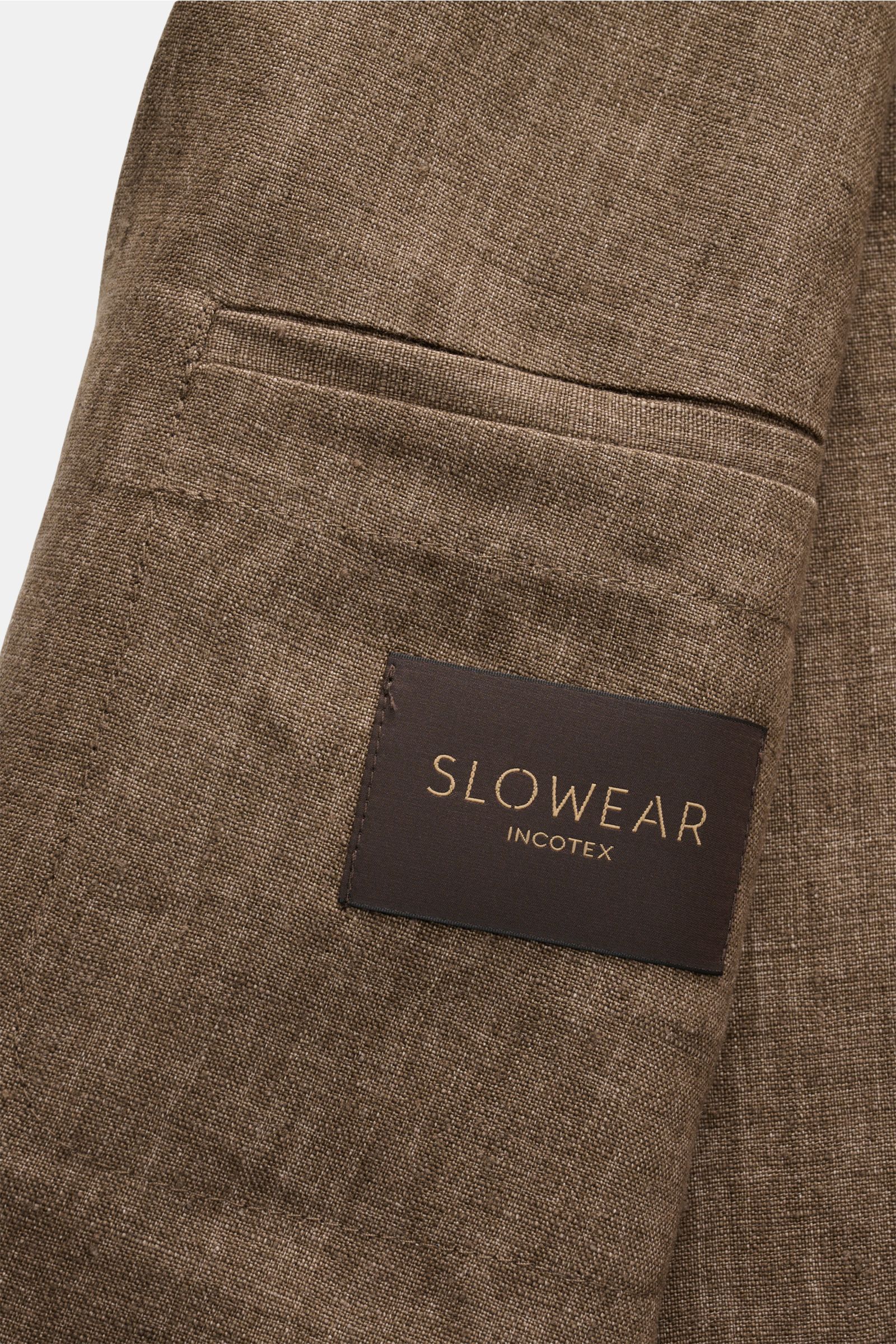Close-up side view of Incotex Linen jacket grey-brown mottled showing textured pure linen fabric, patch pocket, and SLOWEAR Incotex label, summery charm with lightweight, soft fabric, slim fit, step lapel, classic breast pocket, two-button style, kissing 