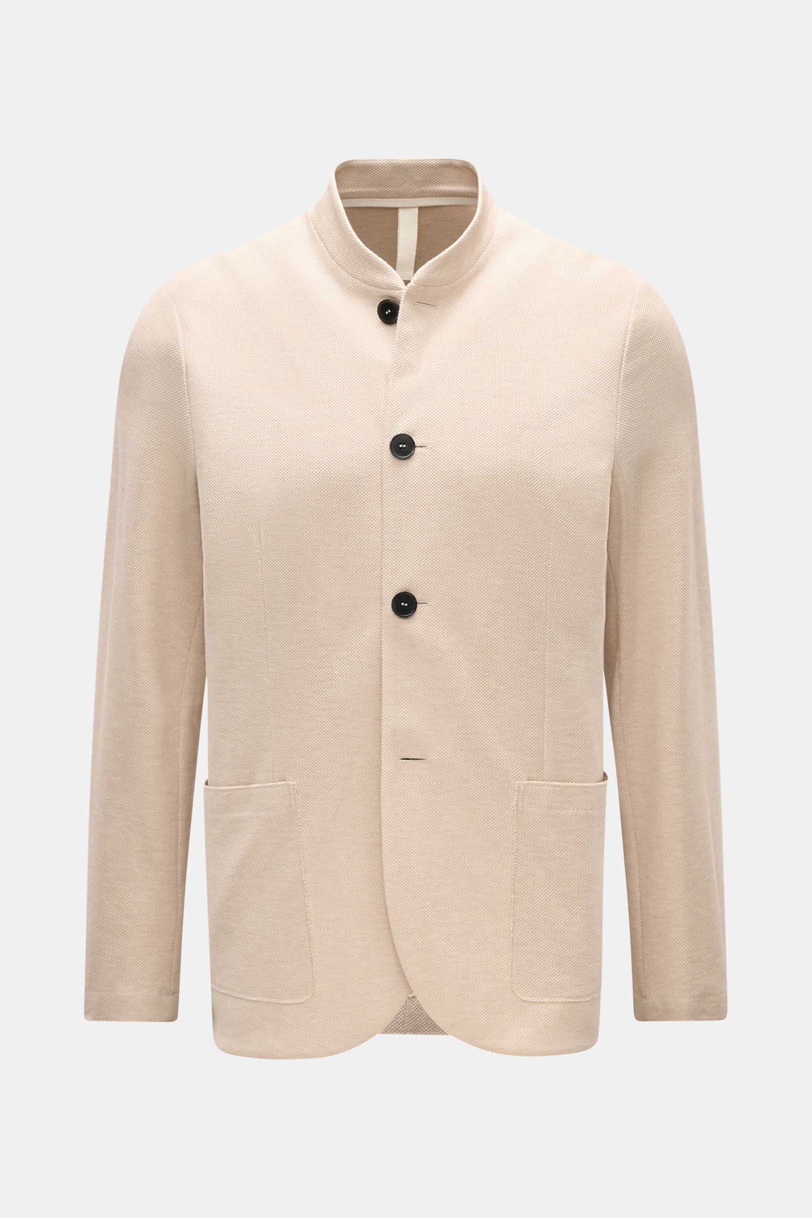 Front view of Harris Wharf London Knit blazer beige made from pure cotton piqué with a slim fit, four-button style, open edge finish, patch hip pockets, two inside pockets, slim standing collar, and unlined design.