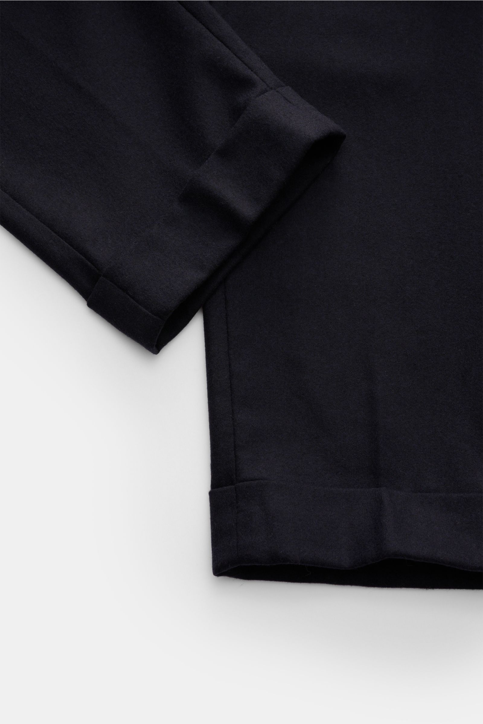 Marco Pescarolo Woll-Jogpants 'Manu' navy shown from a close-up side angle, highlighting the fixed cuff hem and soft wool-cashmere fabric. 