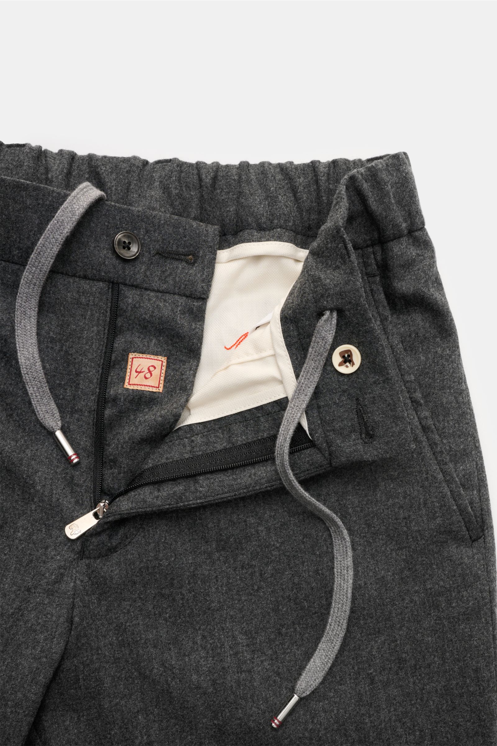 Close-up front view of Marco Pescarolo Woll-Jogpants 'Manu' dunkelgrau meliert showing zipper, button, elastic waistband, and drawstring details.