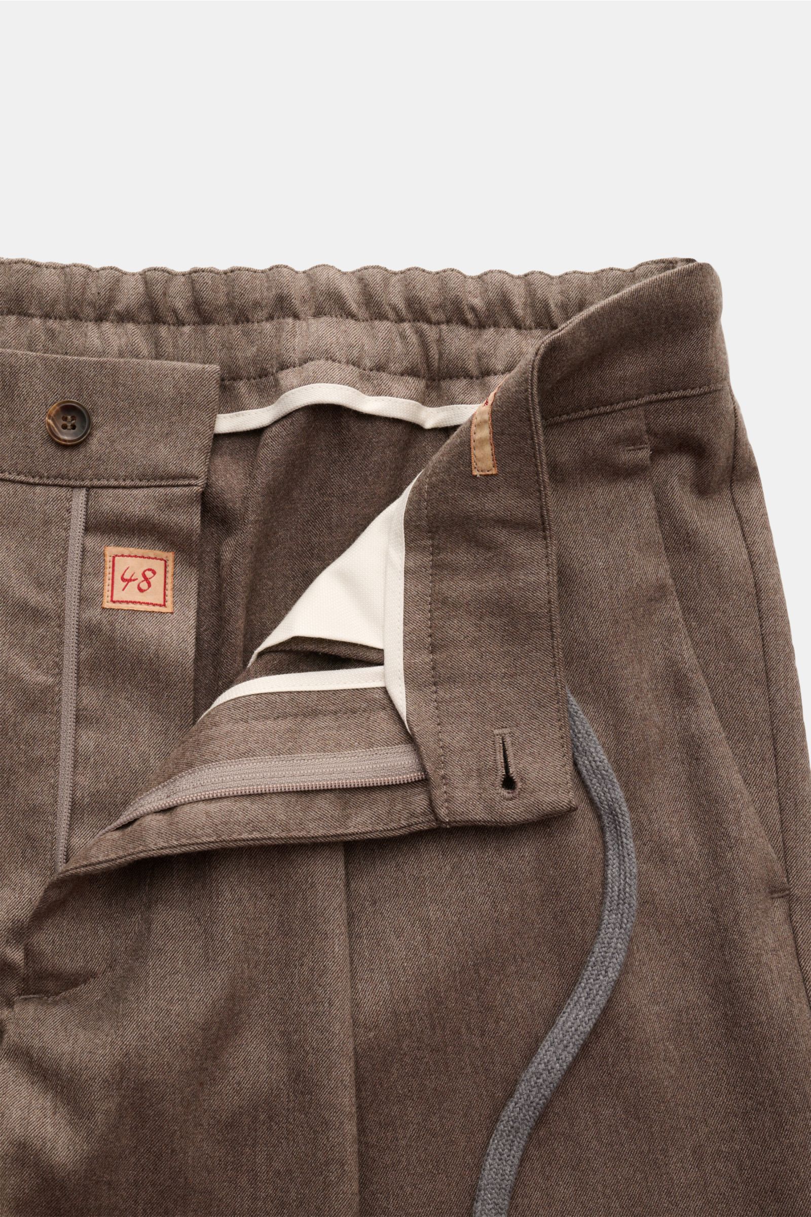 Close-up front view of Marco Pescarolo Cashmere-Jogpants 'Varenne' graubraun meliert showing elastic waistband, button, zipper, and drawstring.

