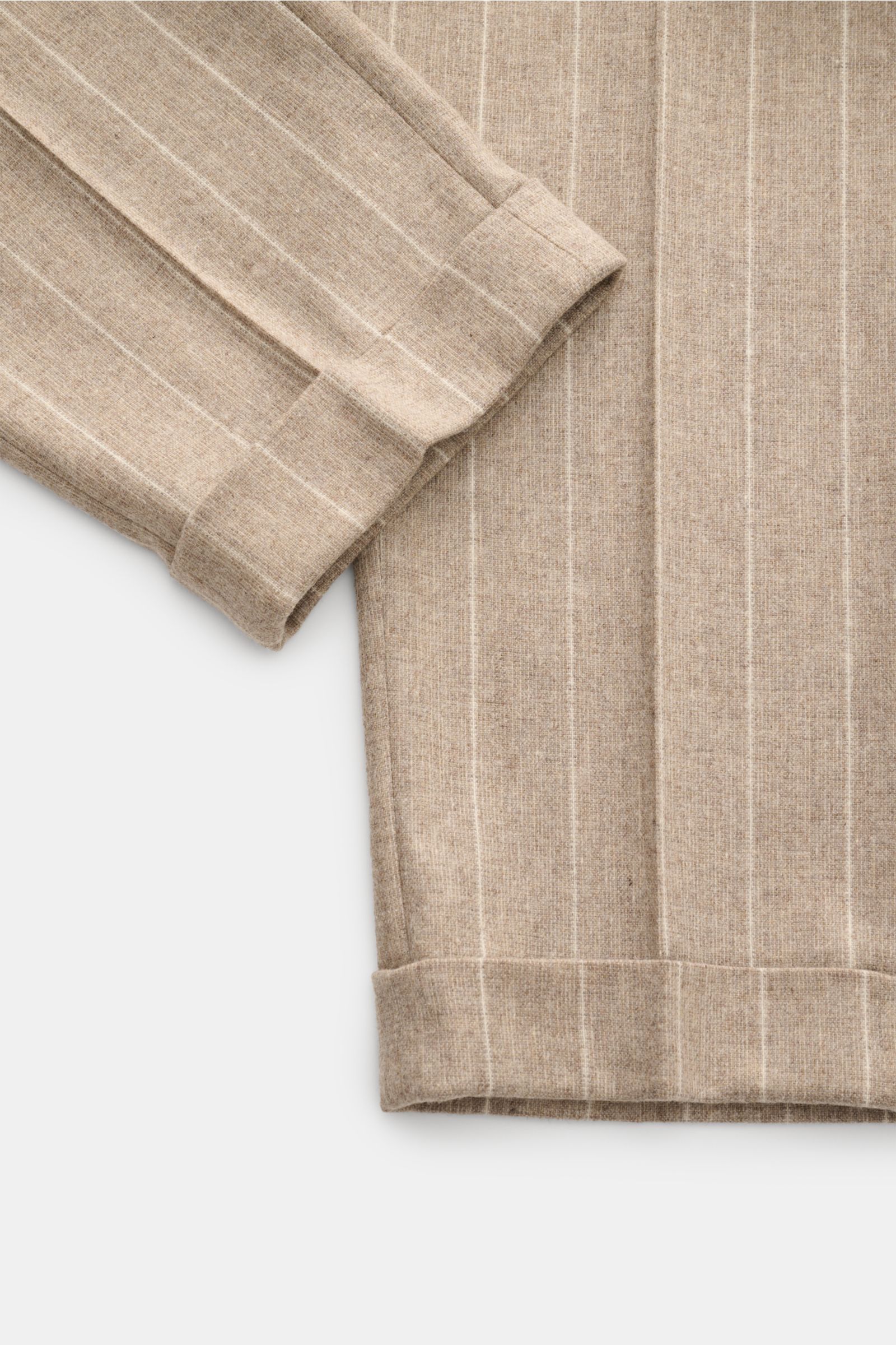 Close-up top view of the beige striped Windsor Hose 'Sapo' showing the cuff and fabric texture with chalk stripes, tapered fit, and soft wool blend.