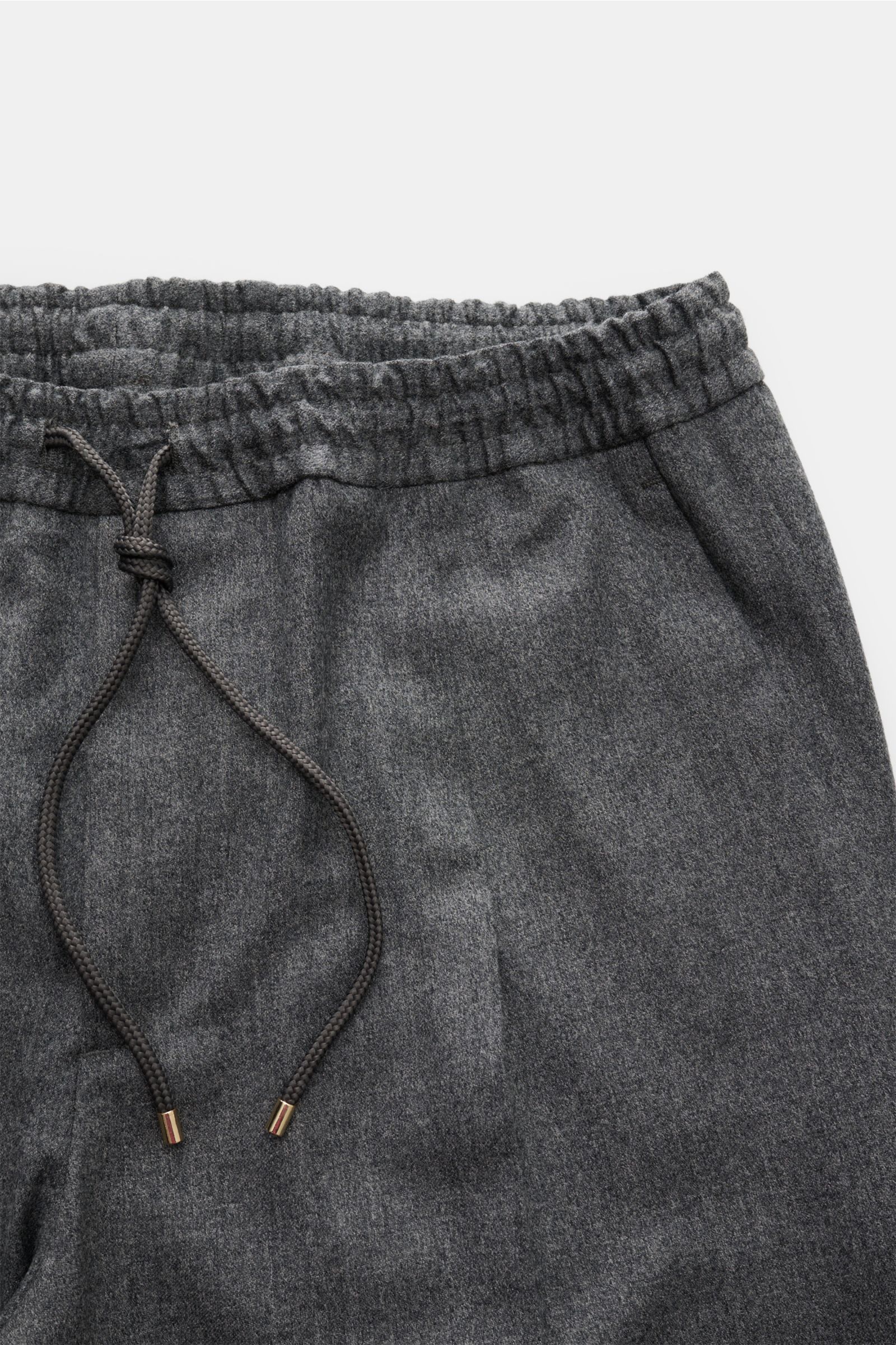 Briglia 1949 Woll-Jogpants 'Wimbledon' grau meliert, knöchellang, Tapered Fit, elastischer Bund mit Tunnelzug, Zip Fly, weiche reine Wolle, Detailfoto von oben.