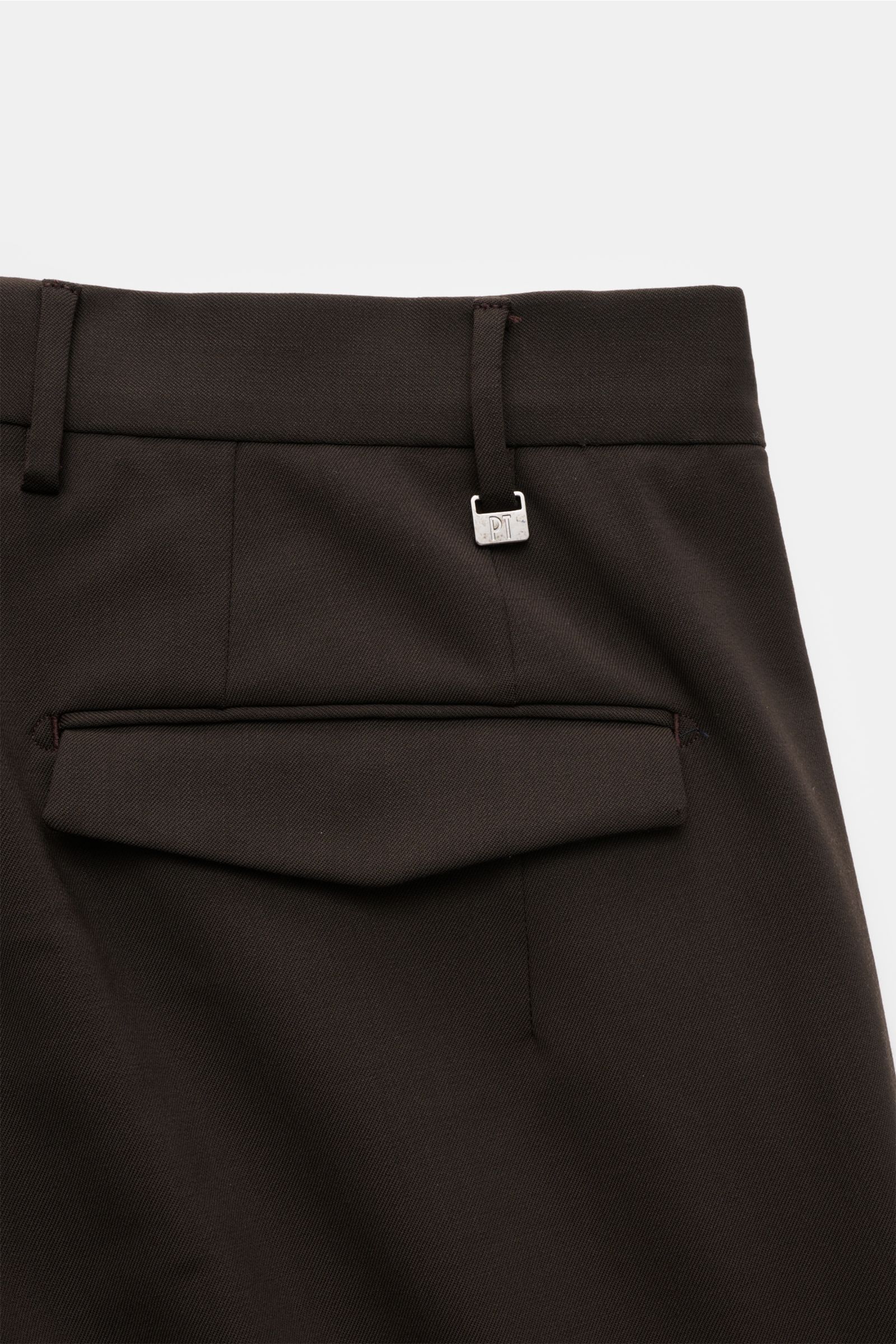 Close-up rear view of PT Torino Wool trousers 'Master Fit' dark brown, showing back pocket with concealed button flap and belt loops.

The trousers 'Master Fit' by PT TORINO are a stylish and comfortable office piece in fine wool with comfortable stret