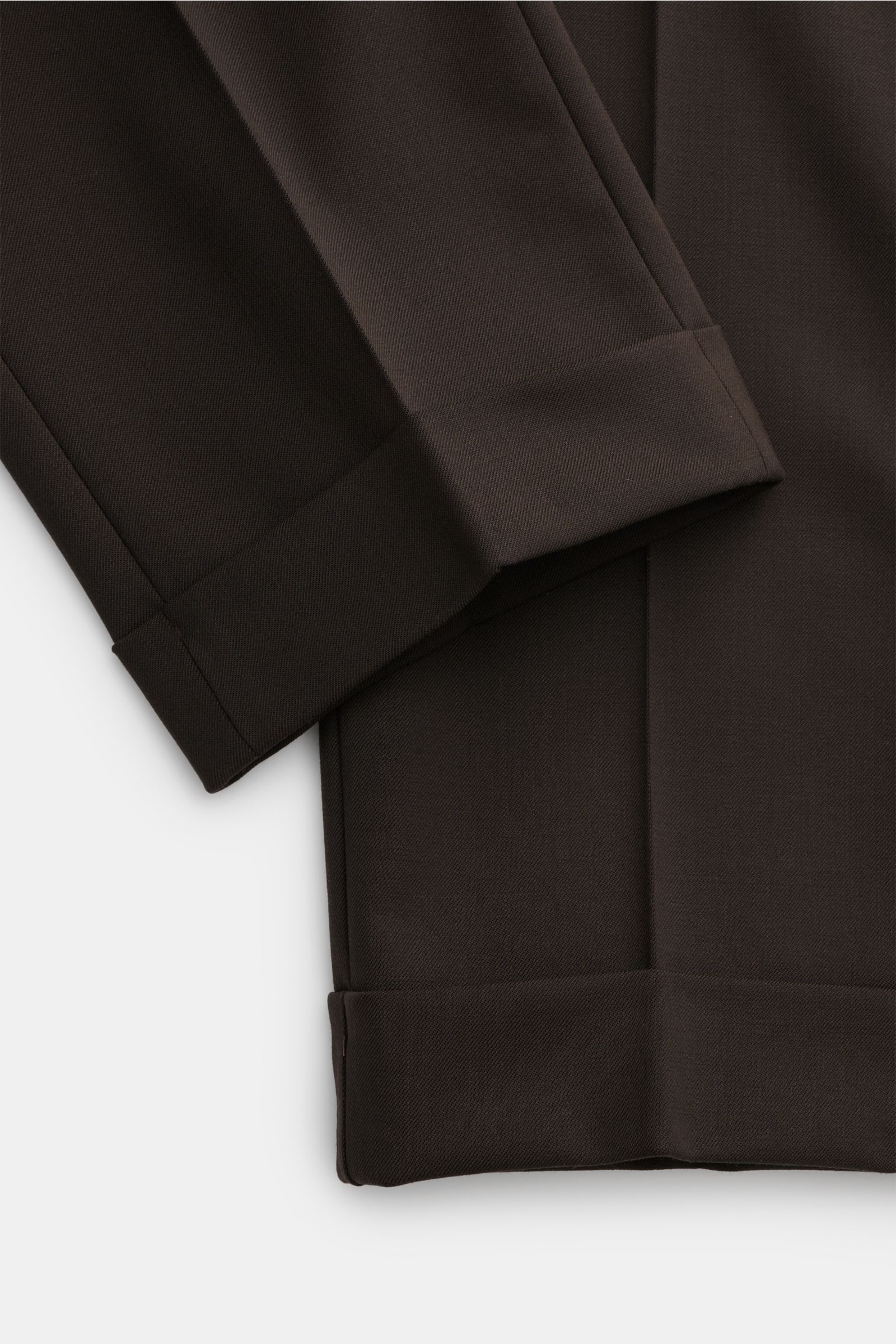 Close-up top-down view of PT Torino Wool trousers 'Master Fit' dark brown showing fixed hem turn-ups and fine wool fabric texture.

The trousers 'Master Fit' by PT TORINO are a stylish and comfortable office piece in fine wool with comfortable stretch 