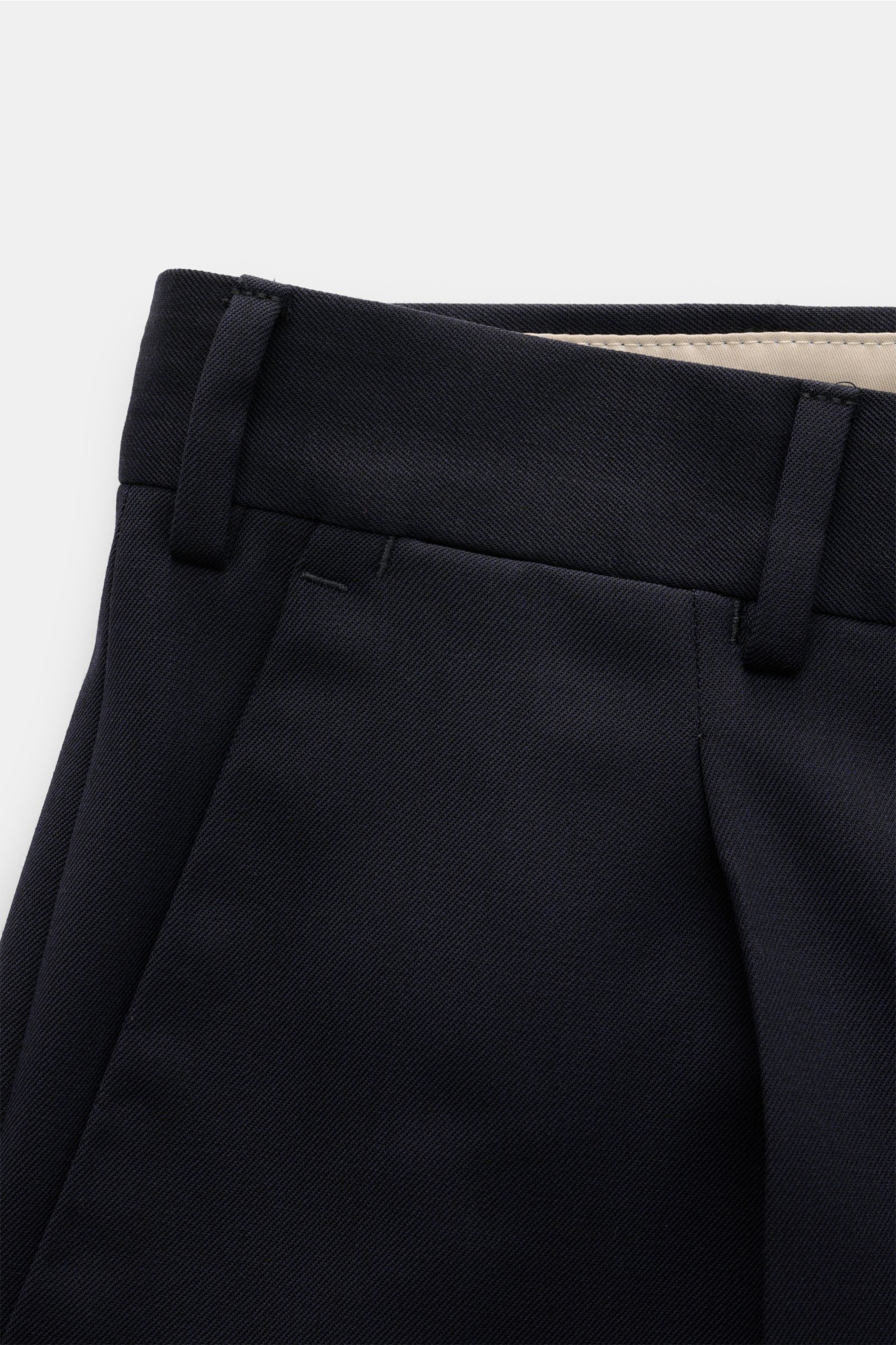 Close-up front top view of PT Torino Hose 'Rebel Fit' navy showing twill microfiber and wool fabric, lightweight elastic quality, slightly textured feel, Rebel Fit taper, regular thigh width, ankle length, zipper and hook closure, single front pleat, smal