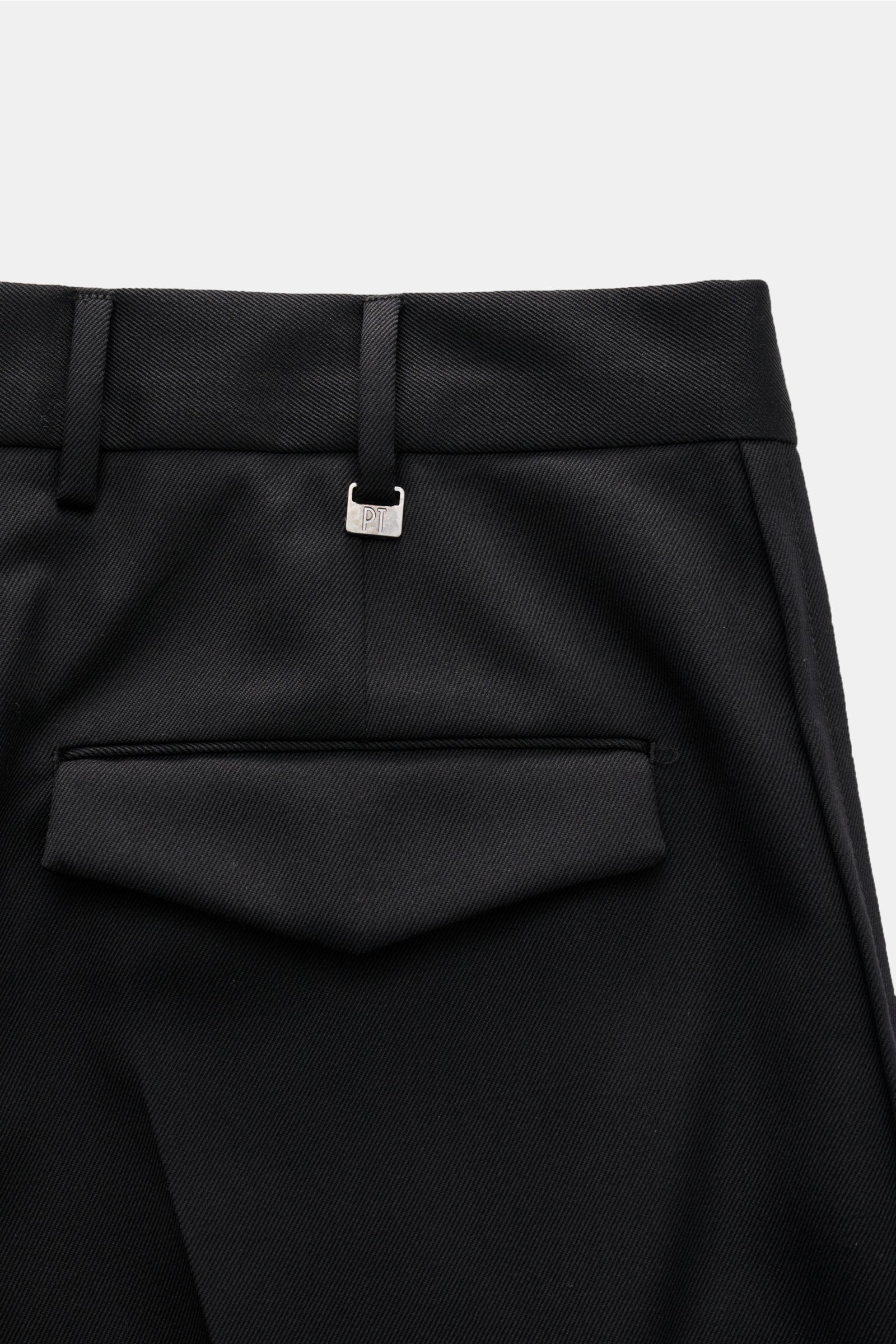 PT Torino Wool trousers 'Michael' black shown from the back close-up, featuring pure wool twill, smooth feel, regular fit, straight cut, zip and waist buttons, French pockets, jetted side seam, back pockets with flap, and small metal logo. Elegance meets 