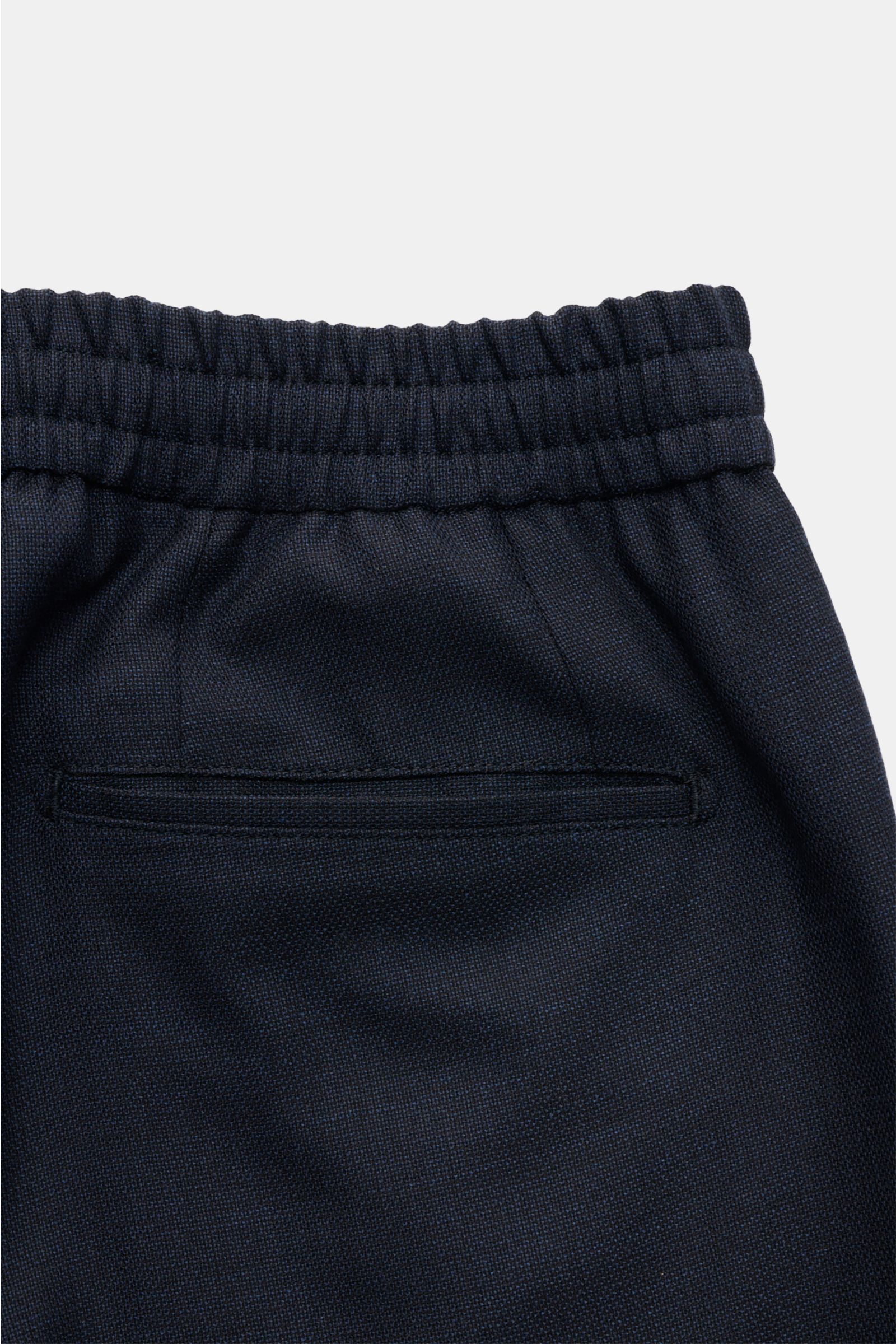 Close-up image of the back upper section of Marco Pescarolo Wool jogger pants 'Chiaia' navy, showing elasticated waistband and jetted back pocket. The elegant jogger pants 'Chiaia' by Italian fashion label MARCO PESCAROLO combine lightweight fabric in pur