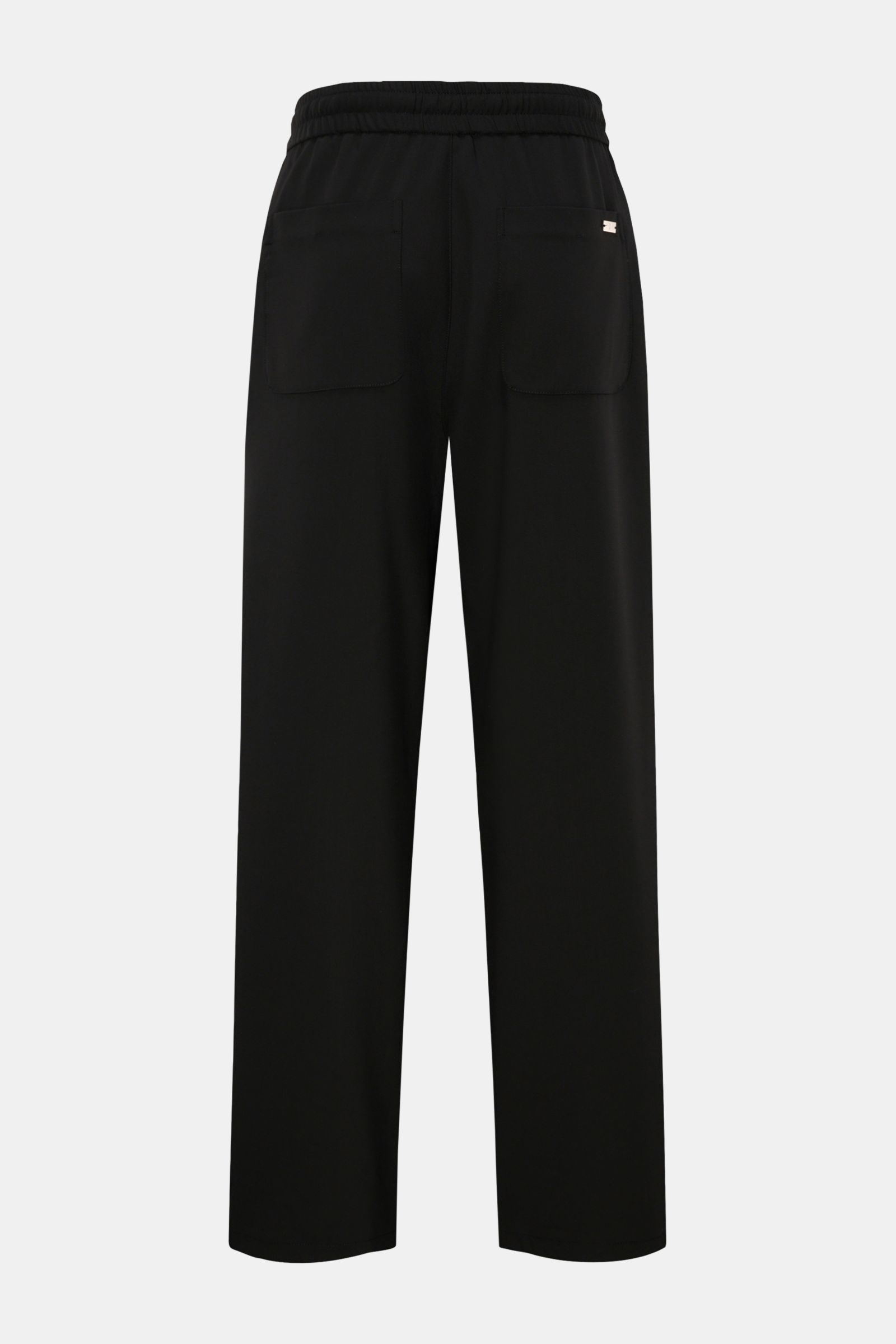 Ami Paris Jogger pants black shown from the back, featuring a high waist, elasticated waistband with drawstring, patch back pockets, and loose fit in pure virgin wool, lightweight fabric with a cool feel, zip and waist button, French pockets, and a slight