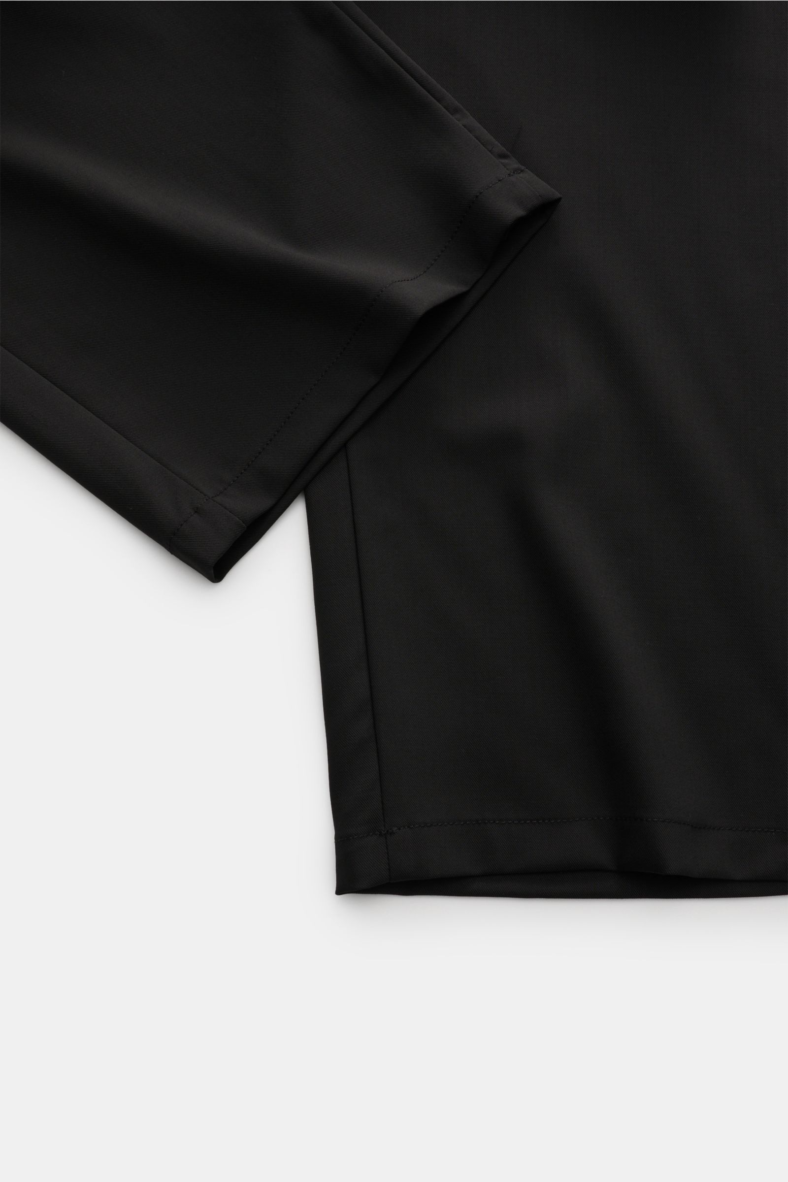 Close-up front-side view of Ami Paris Jogger pants black, showing pure virgin wool fabric, elasticated waistband, high waist, and relaxed fit.

Description: Trendy oversized fits are easy to style with these relaxed fit jogger pants from AMI PARIS – th