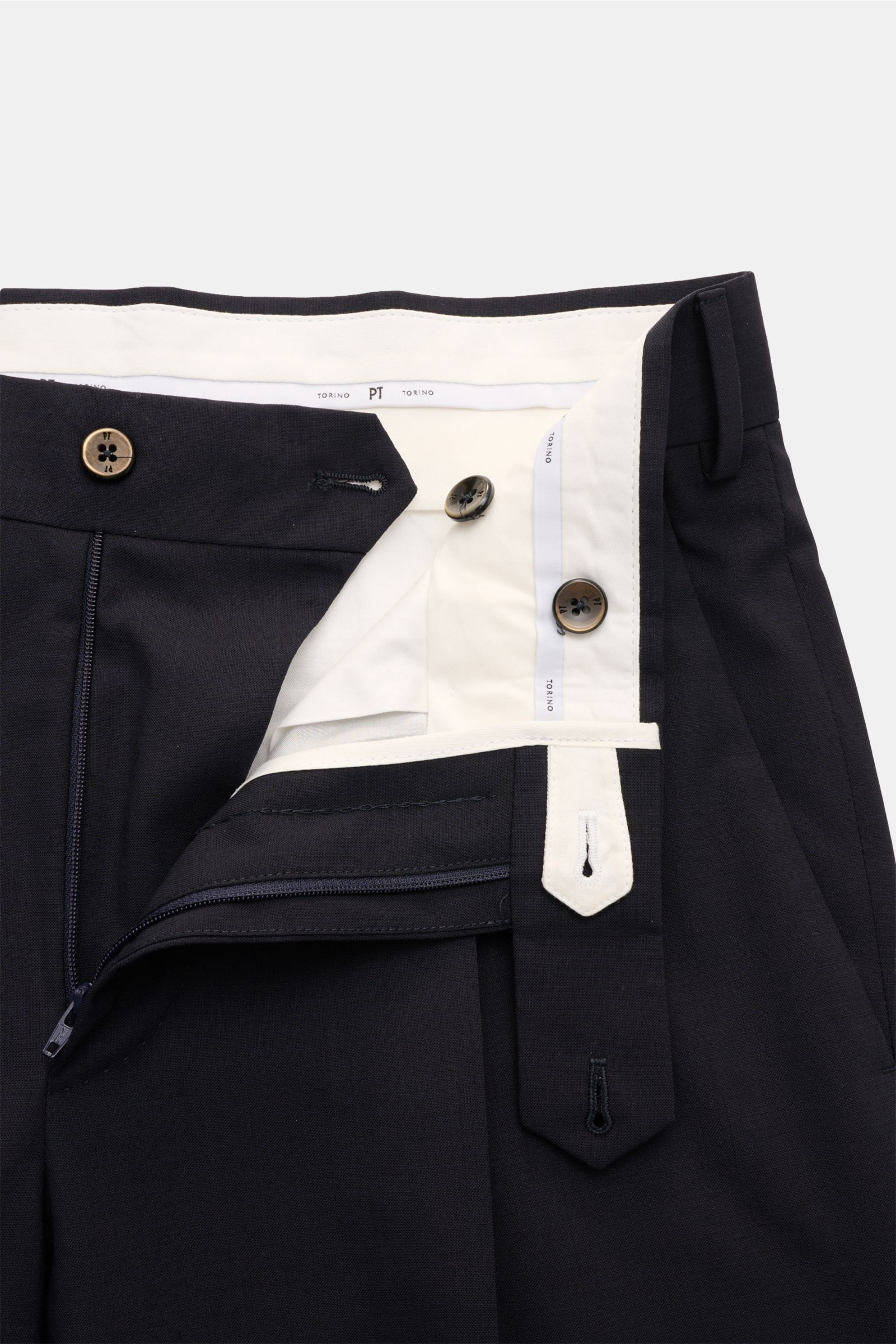 Alt tag (125 characters max):
Close-up front view of PT Torino Wool trousers 'Union Fit' navy showing waistband, buttons, zipper, and inner lining details.

Description:
The 'Union Fit' from trouser specialists PT TORINO is the perfect choice for the c