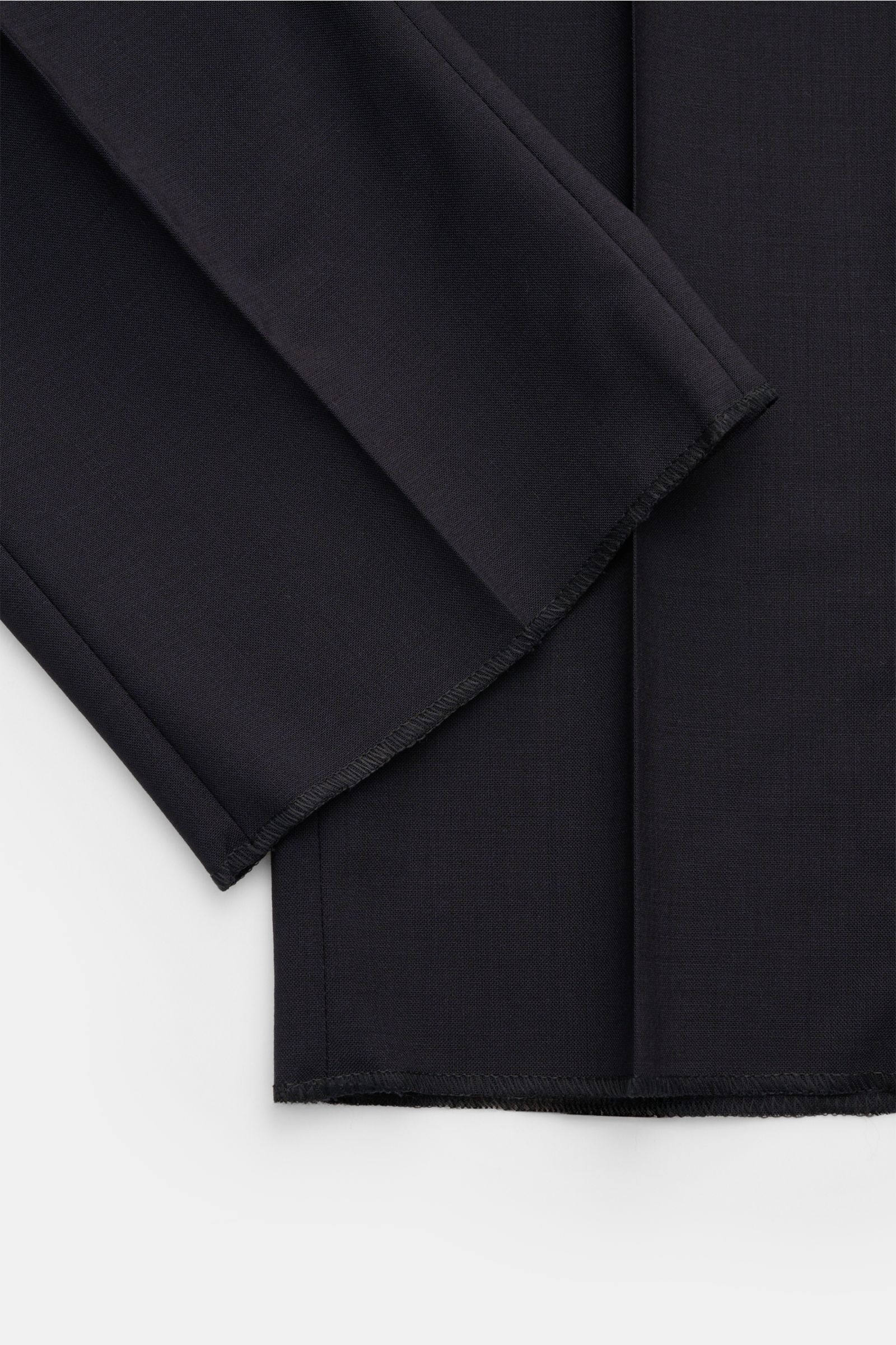 Close-up of navy PT Torino Wool trousers 'Union Fit' fabric and hem, photographed from above, showing smooth texture and fine stitching.

Description: The 'Union Fit' from trouser specialists PT TORINO is the perfect choice for the coming season. The l