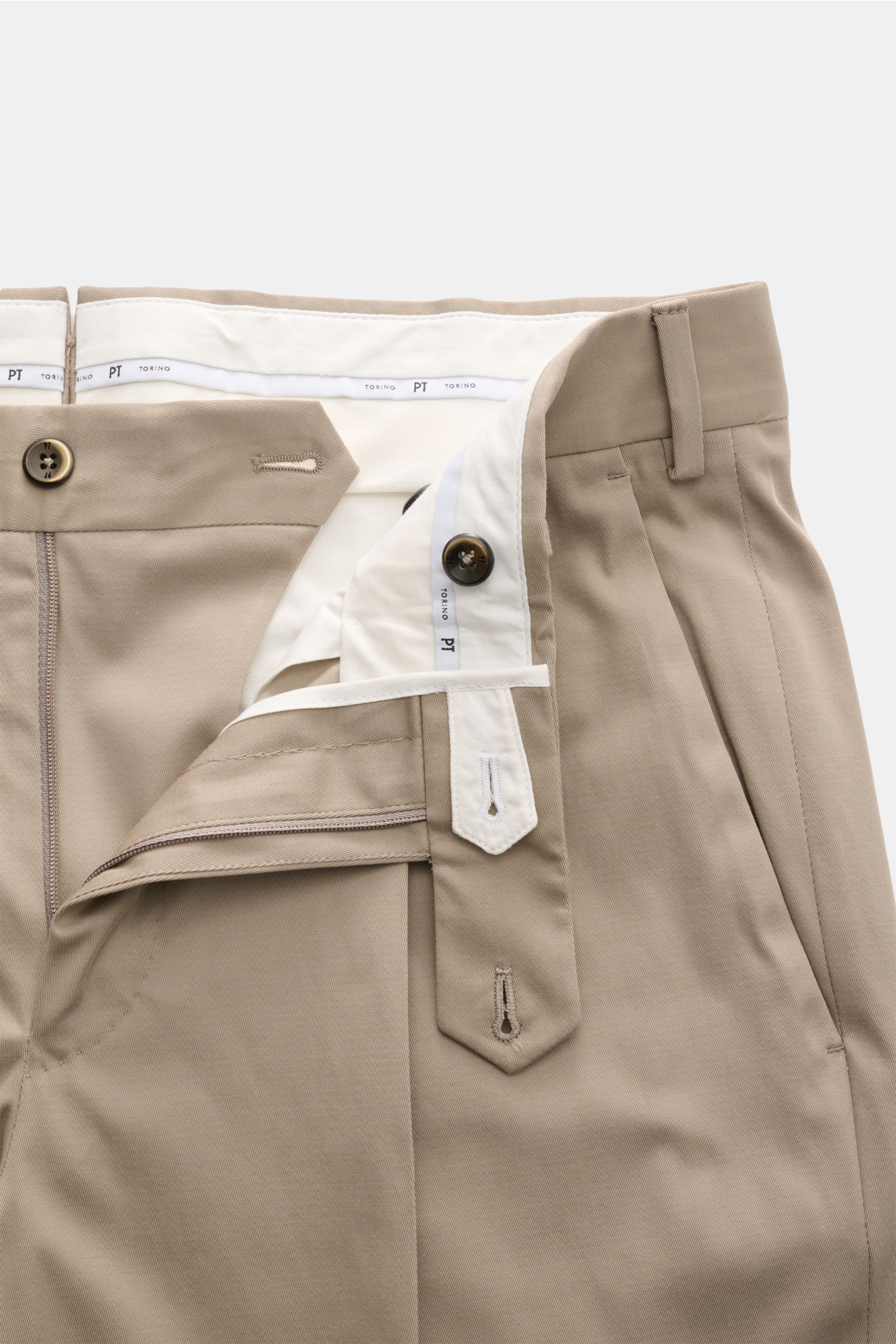 Close-up front view of PT Torino Chinos 'Union Fit' beige, showing open waistband with button, zipper, and pleat. A versatile companion for spring and summer: For these chinos, PT TORINO combines a fine cotton-silk blend with subtle stretch content for ex
