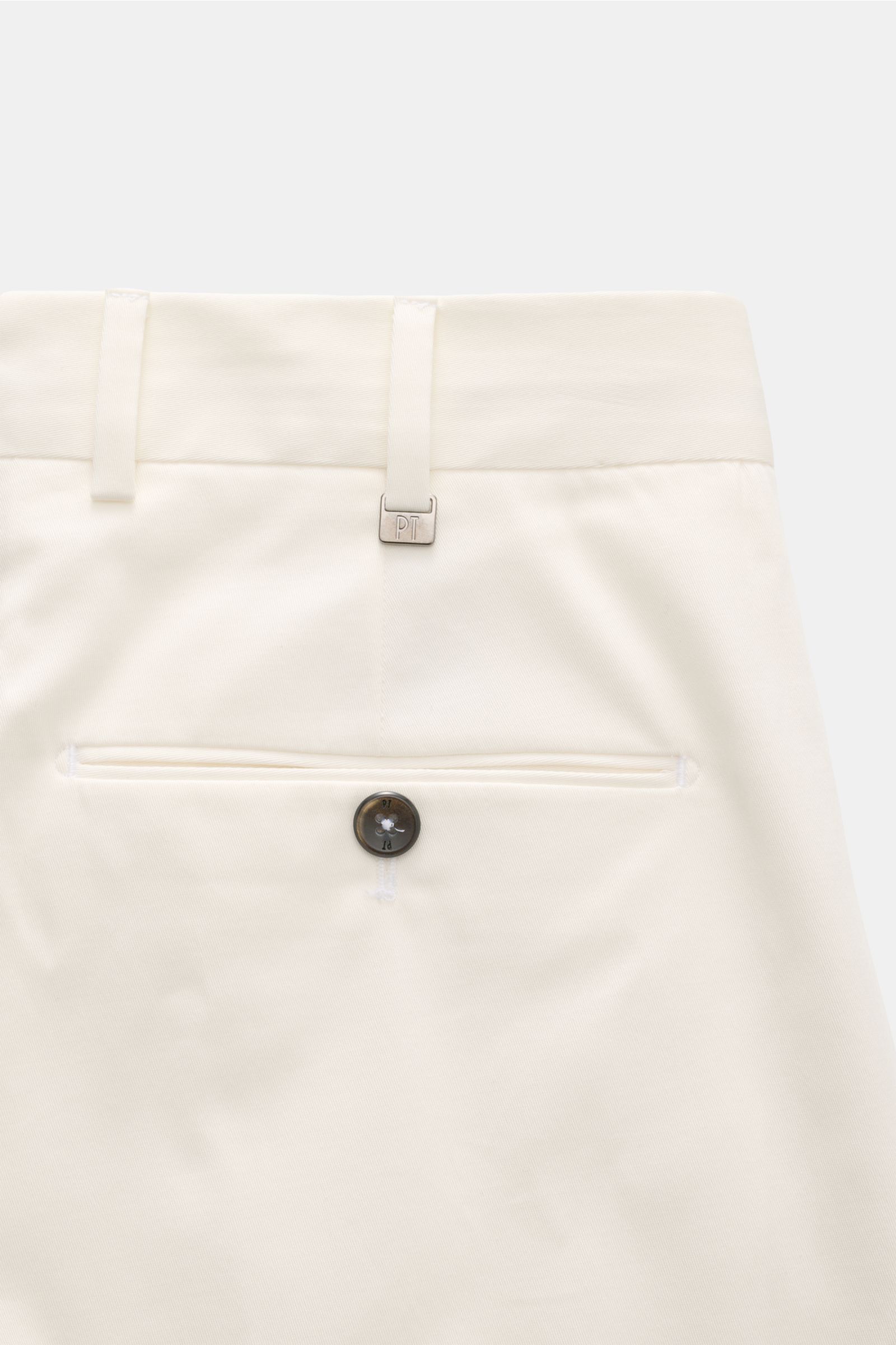 Close-up rear view of PT Torino Chinos 'Union Fit' cream, showcasing twill cotton-silk blend with stretch, soft feel, regular tapered fit, zip and waist buttons, simple pleat, French pockets, small watch pocket, jetted back pockets with button, and open l