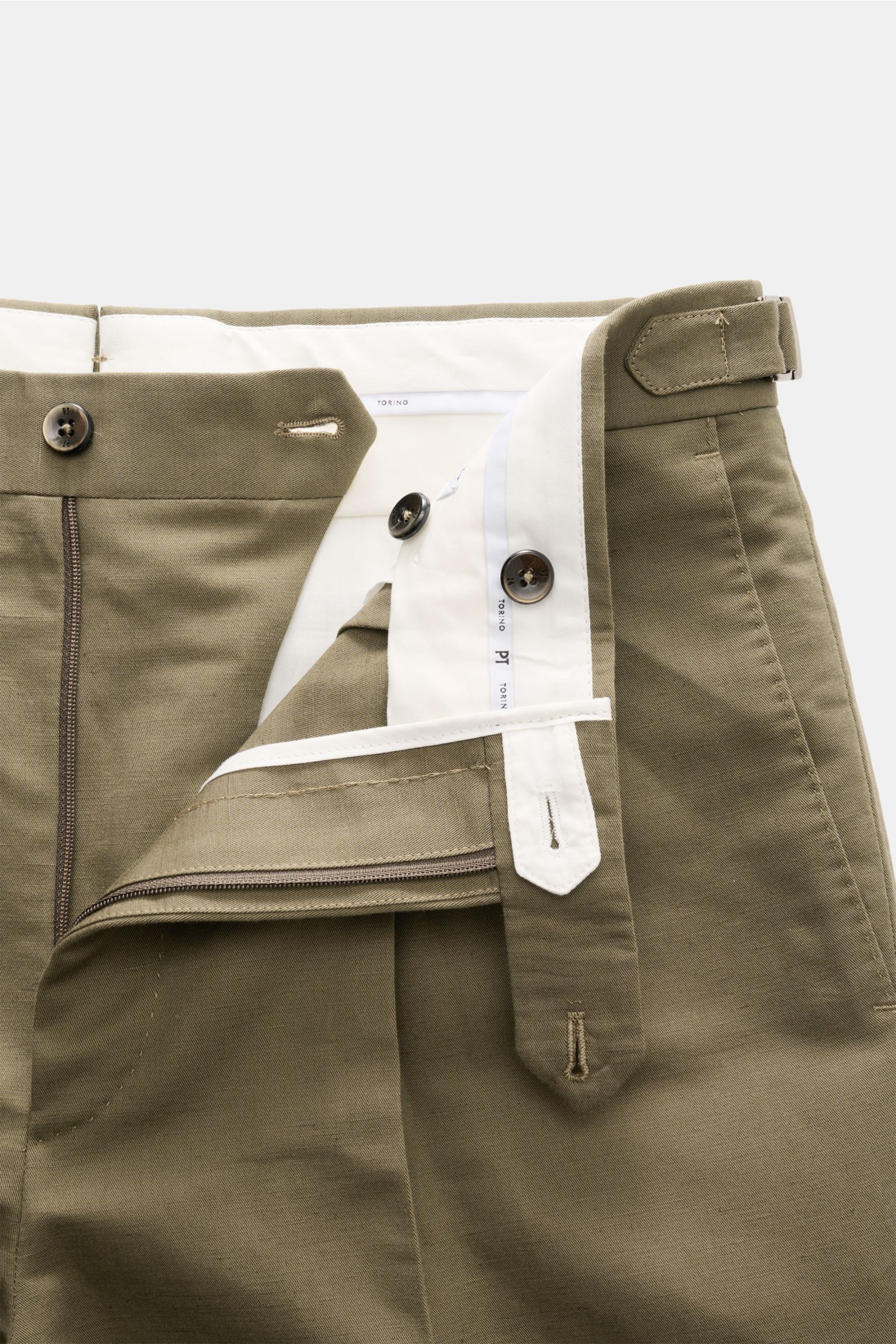 Close-up front view of PT Torino Trousers 'Gentleman Fit' taupe showing zip, buttons, and side adjuster in linen-cotton blend.

For these exclusive 'Gentleman Fit' trousers, PT TORINO has chosen a summery blend of linen and cotton – the perfect model f