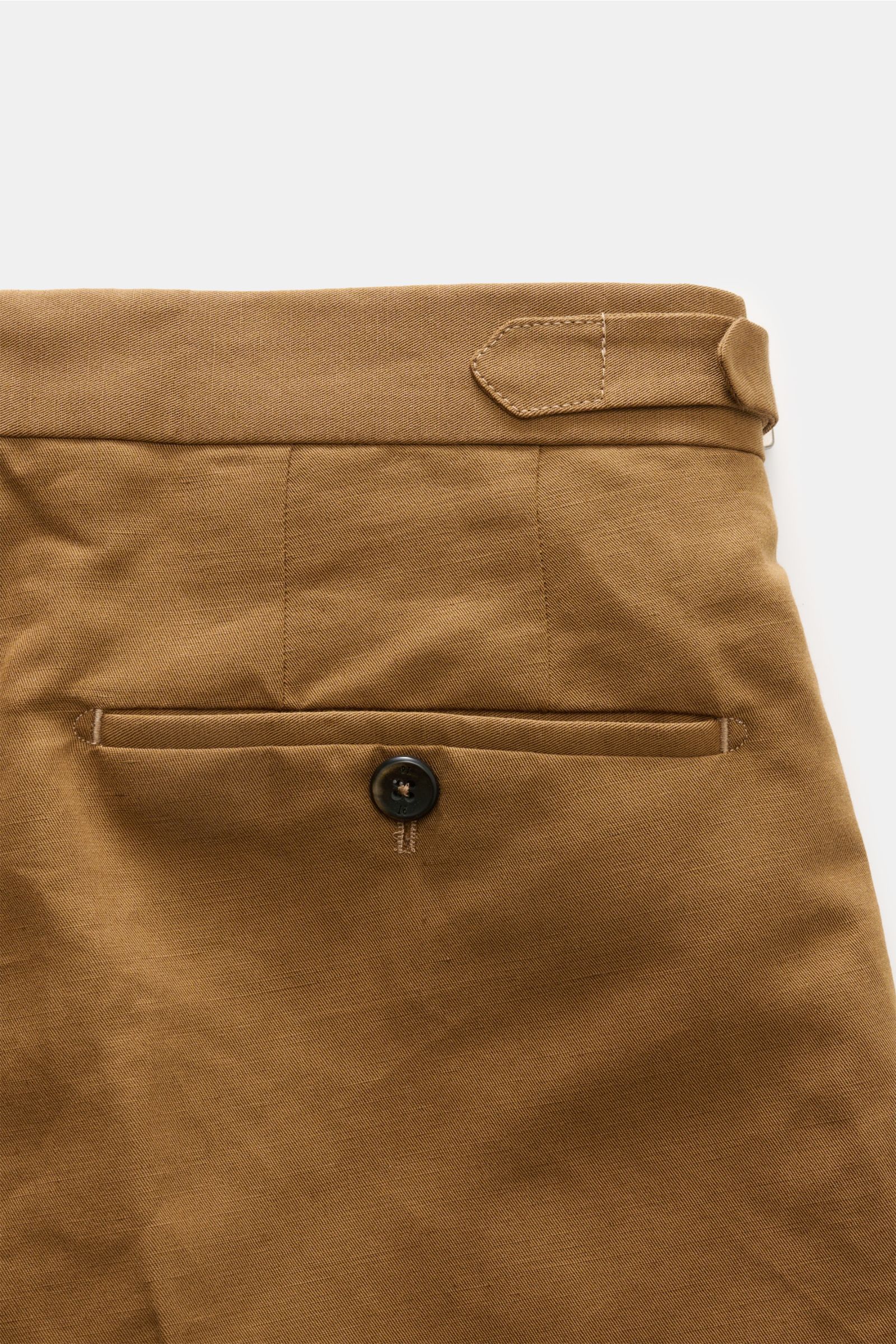 Close-up rear view of PT Torino Trousers 'Gentleman Fit' brown showing jetted back pocket with button, side adjuster, and waistband details.

Description: For these exclusive 'Gentleman Fit' trousers, PT TORINO has chosen a summery blend of linen and c