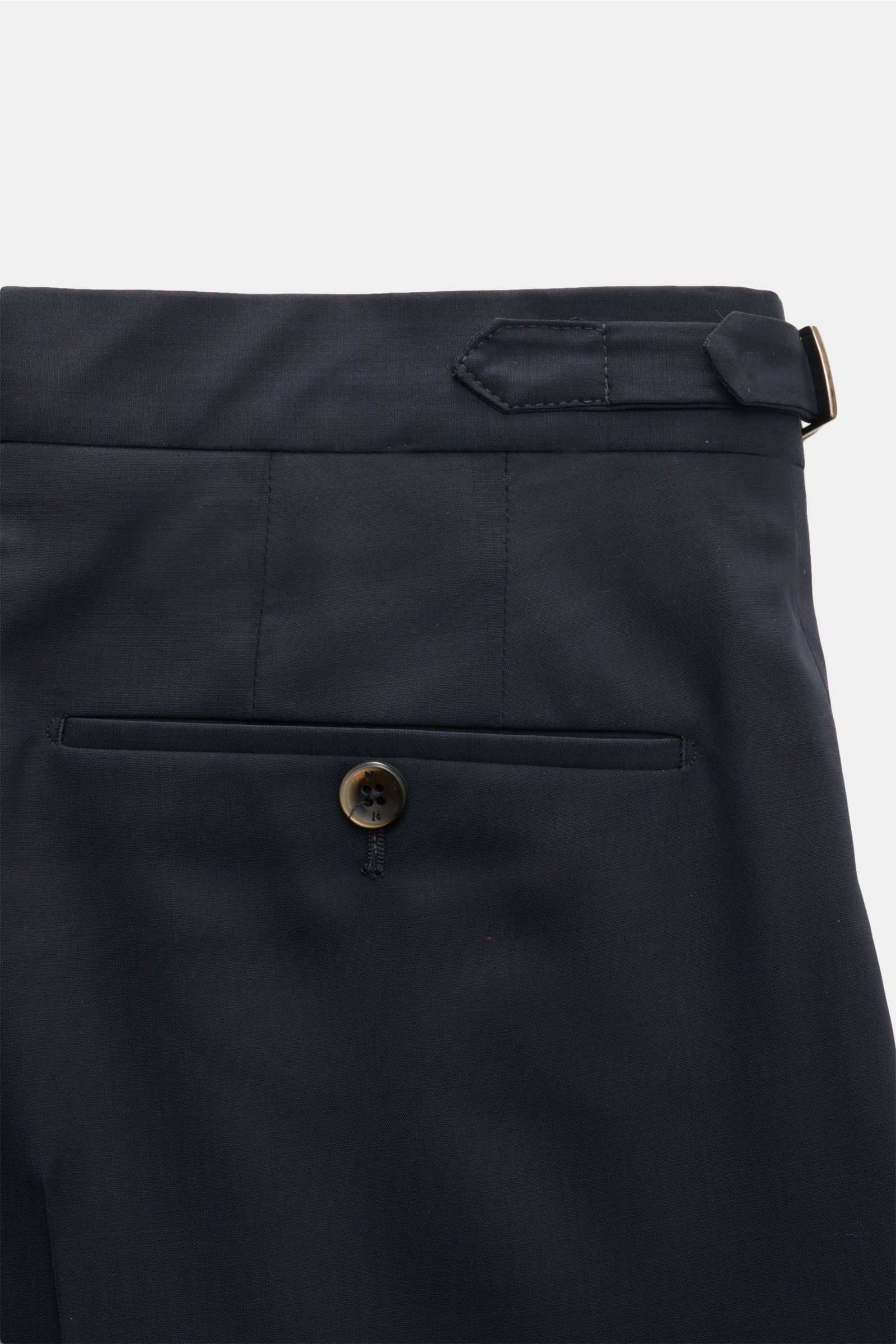 Close-up rear view of PT Torino Wool trousers 'Gentleman Fit' navy, showing side adjuster, jetted back pocket with button, made of pure Super 130'S virgin wool, soft, lightweight fabric with slim, very tapered cut and double pleat, zip and waist buttons, 