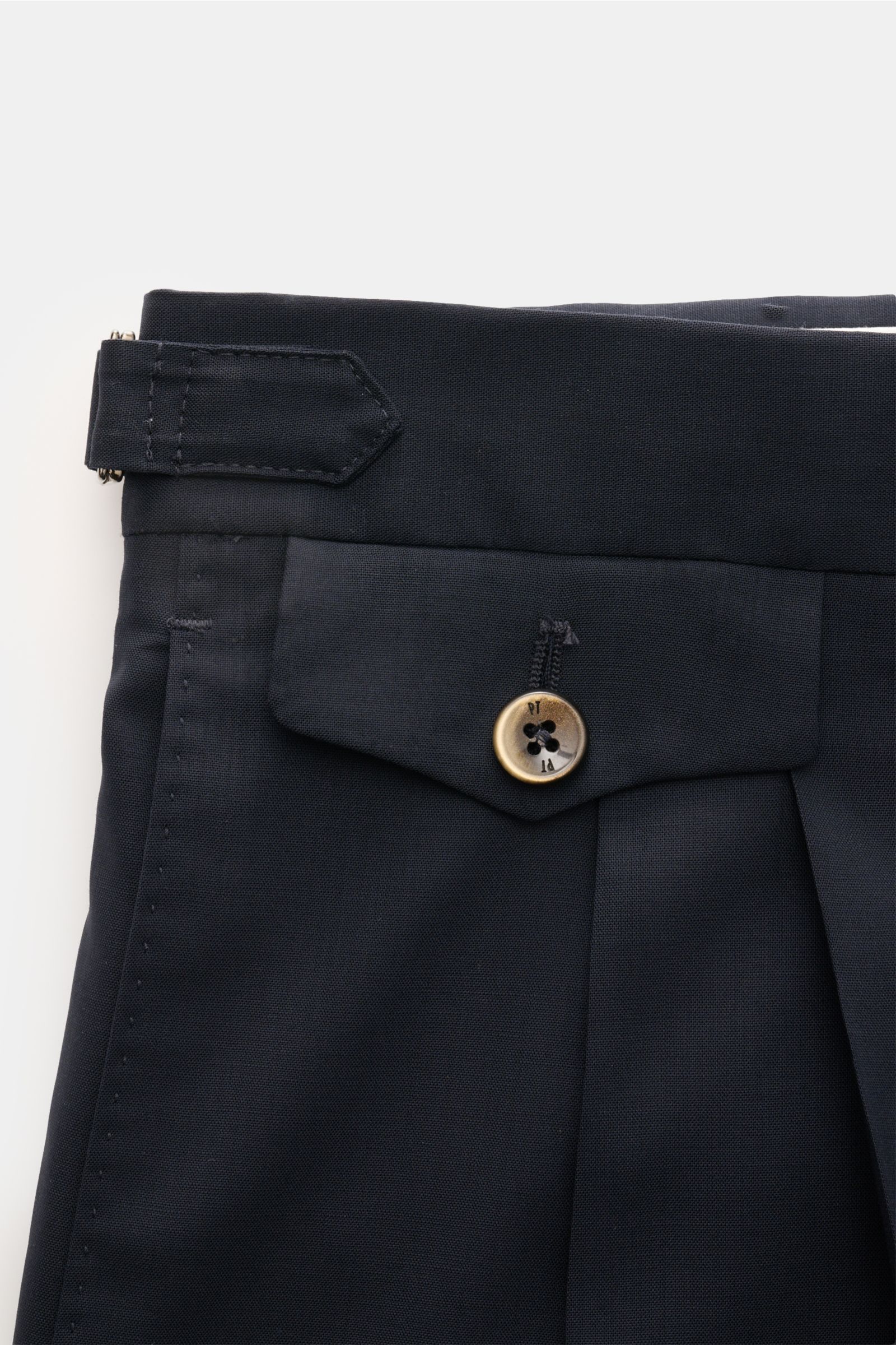 Close-up front view of PT Torino Wool trousers 'Gentleman Fit' navy, showcasing zip and waist buttons, side adjuster, double pleat, and buttoned watch pocket. For the exclusive trousers 'Gentleman Fit', PT TORINO has chosen virgin wool in lightweight Supe
