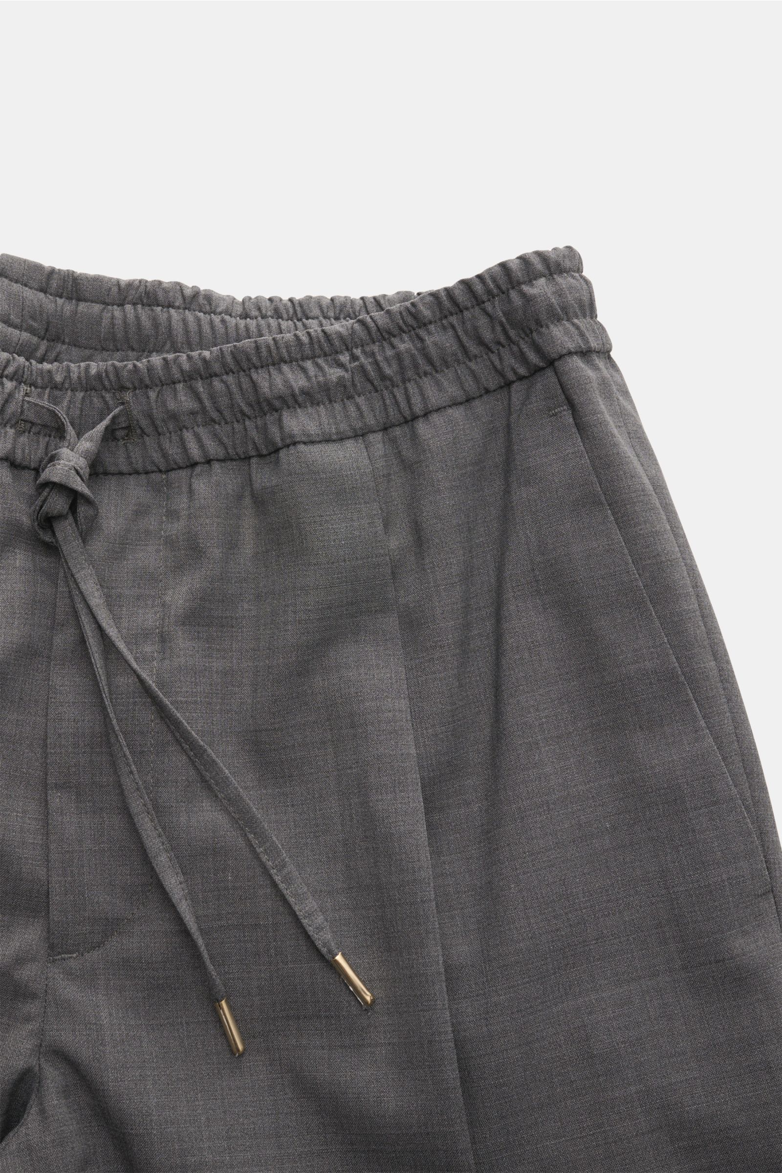 Close-up front view of Briglia 1949 Wool jogger pants 'Wimbledon' grey mottled, showing elasticated waistband with drawstring, zip fly, single pleat, and French pockets. Italian style and maximum comfort meet in these lightweight jogger pants from BRIGLIA